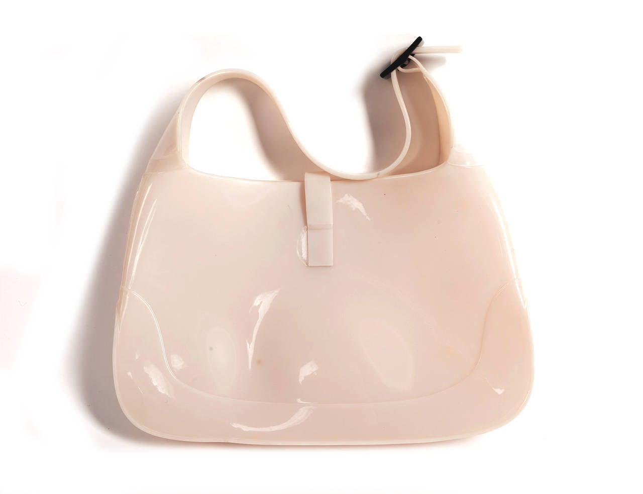 Iconic Gucci by Tom Ford Opalescent Jackie hobo rubber shoulder bag. Bag is in a milky white rubber texture and color with all the iconic details of the Jackie Hobo Bag, black plastic clasp closure, side black buckle, Extreme Futuristic luxury from
