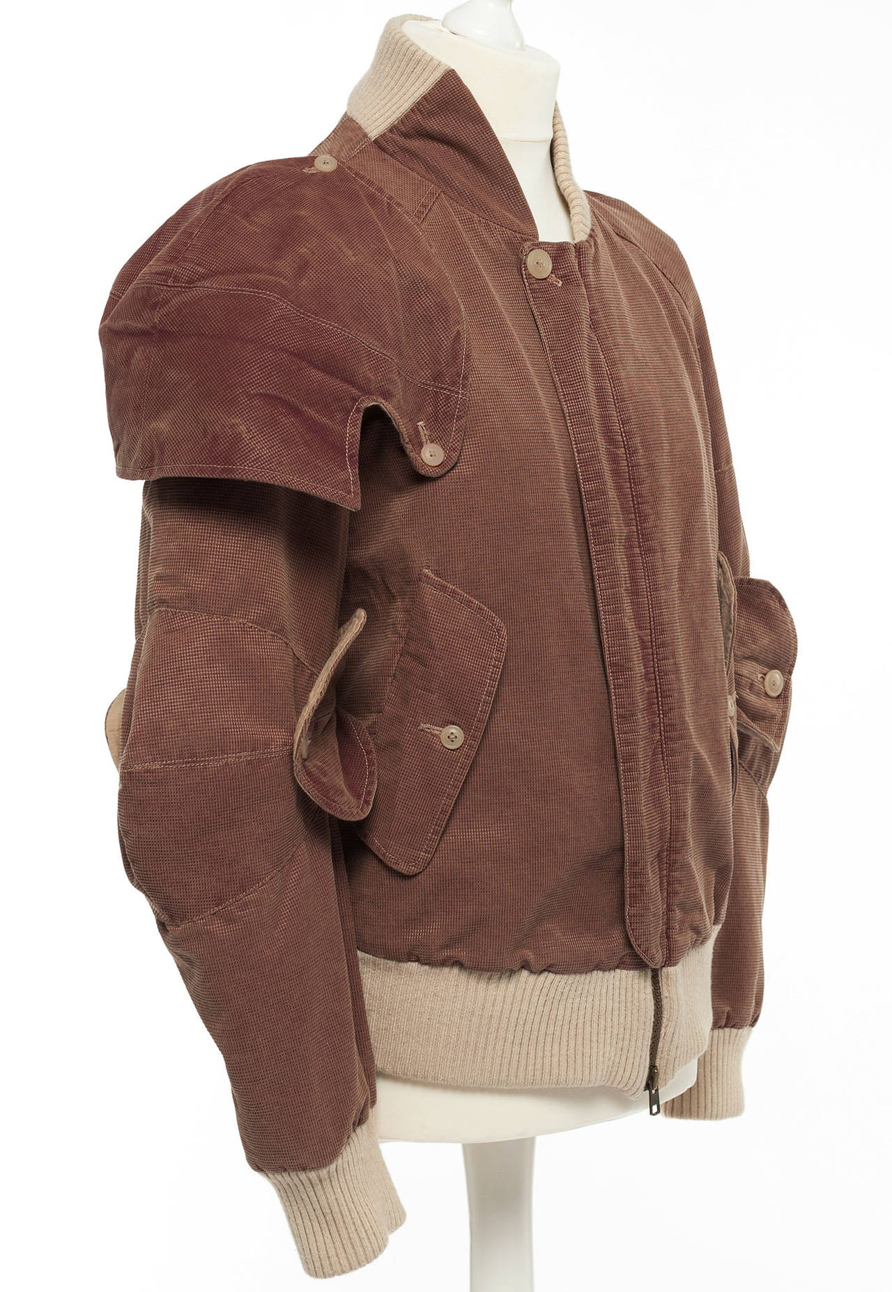 The armor jacket is the second reproduction of this Weswtood classic form the 1980's. Now made for the MAN Collection in a printed tweed like pattern. Jacket has all the essential details of a medieval armor as only Westwood can do. Lining has some