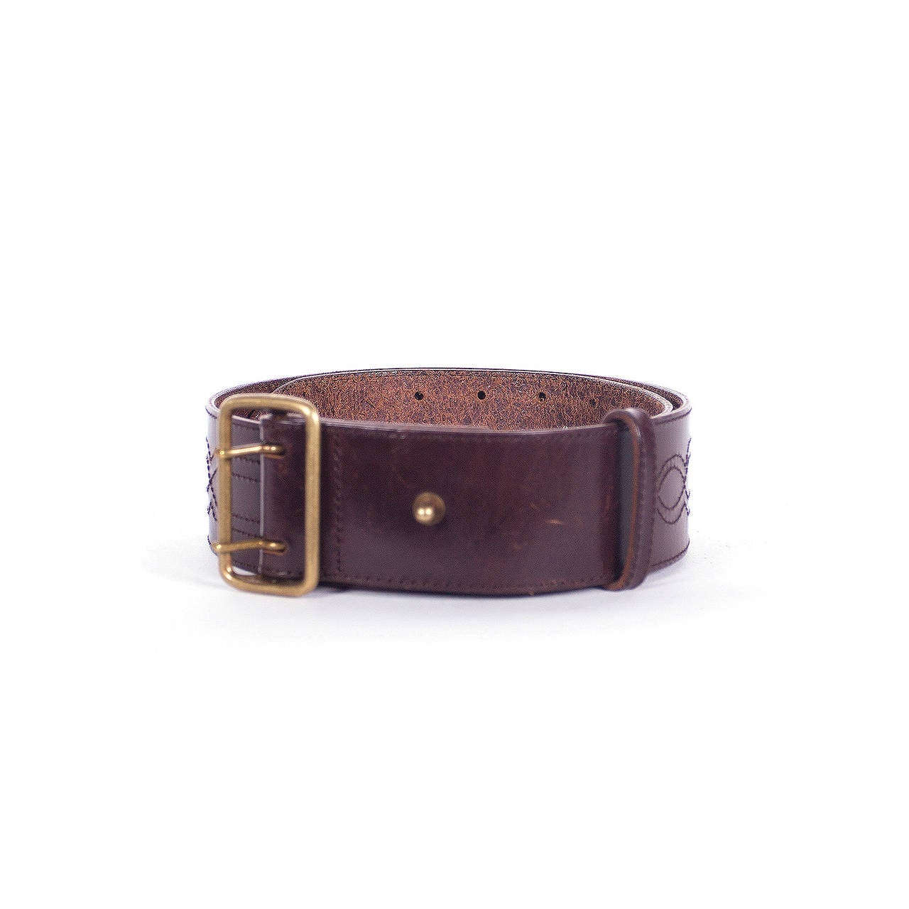 Azzedine Alaia Paris seamed leather belt. Belt is a chocolate brown matte leather, topstitched raised seams from front to back, criss crossing to give triangular effect. Belt has brushed gold double buckle with one hook and belt loop closure. Belt