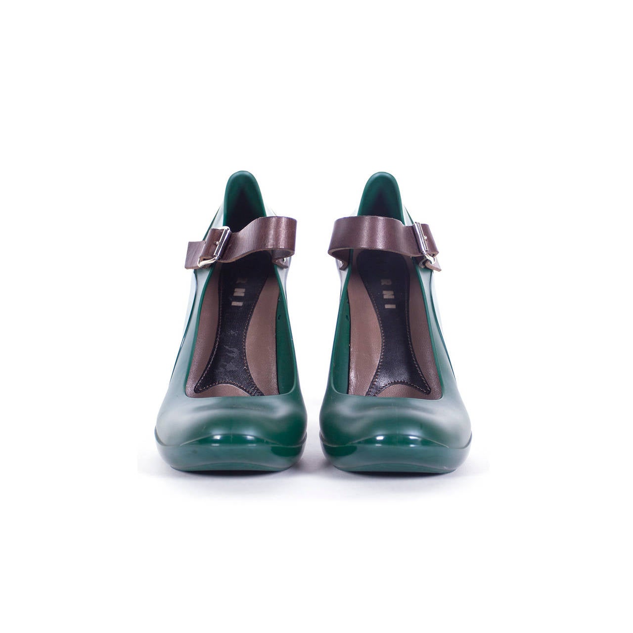 Marni forest green mary jane style rubber high heels with brown leather strap.
Shoes are a glossy finish with a mate brown leather strap at ankle with a buckle and a snap for closure. Made in Italy. EU size 41.
