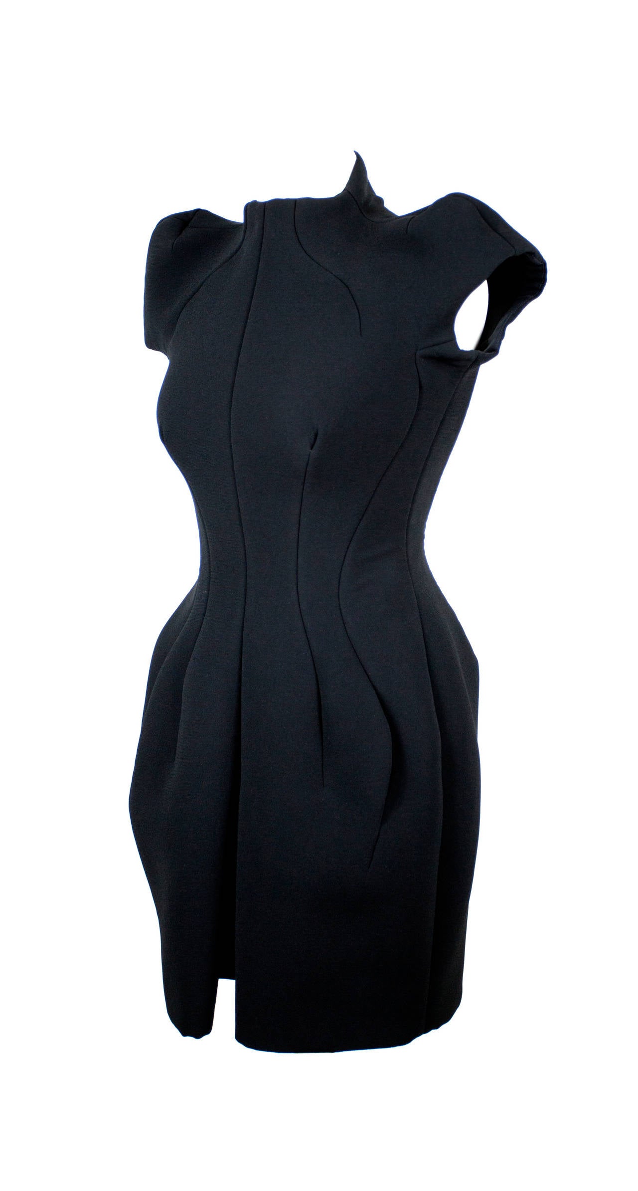 Vintage Balenciaga by Nicolas Ghesquière Diabolic black fitted dress from Spring 2008. Iconic collection from Nicolas Ghesquière, all seams are made to float or stand away from body as if they were floating. The structure of dress is made from