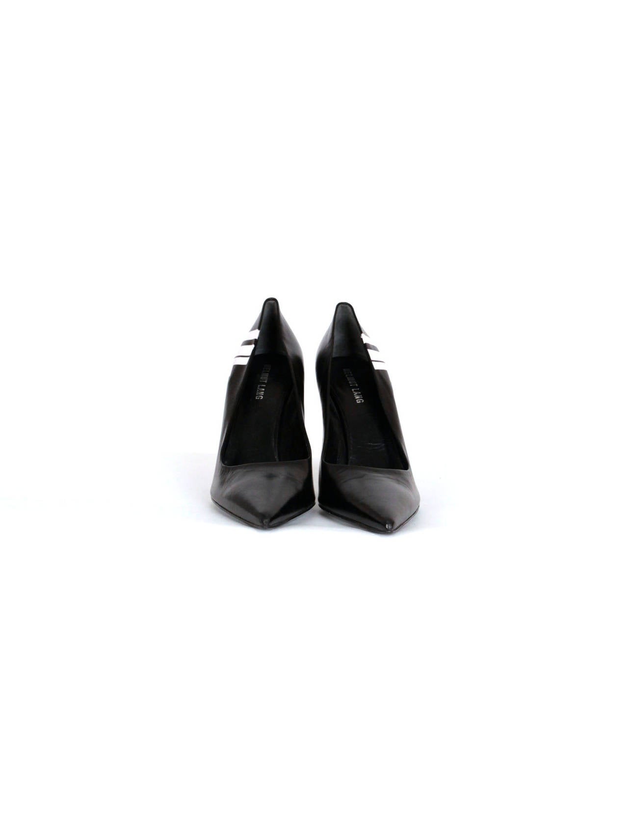 Helmut Lang black pointed pumps with spiked heel and Helmut lang initials in white on side of pump. This period I would strongly assume was the collaboration between Melanie Ward and Helmut Lang. Iconic Era.