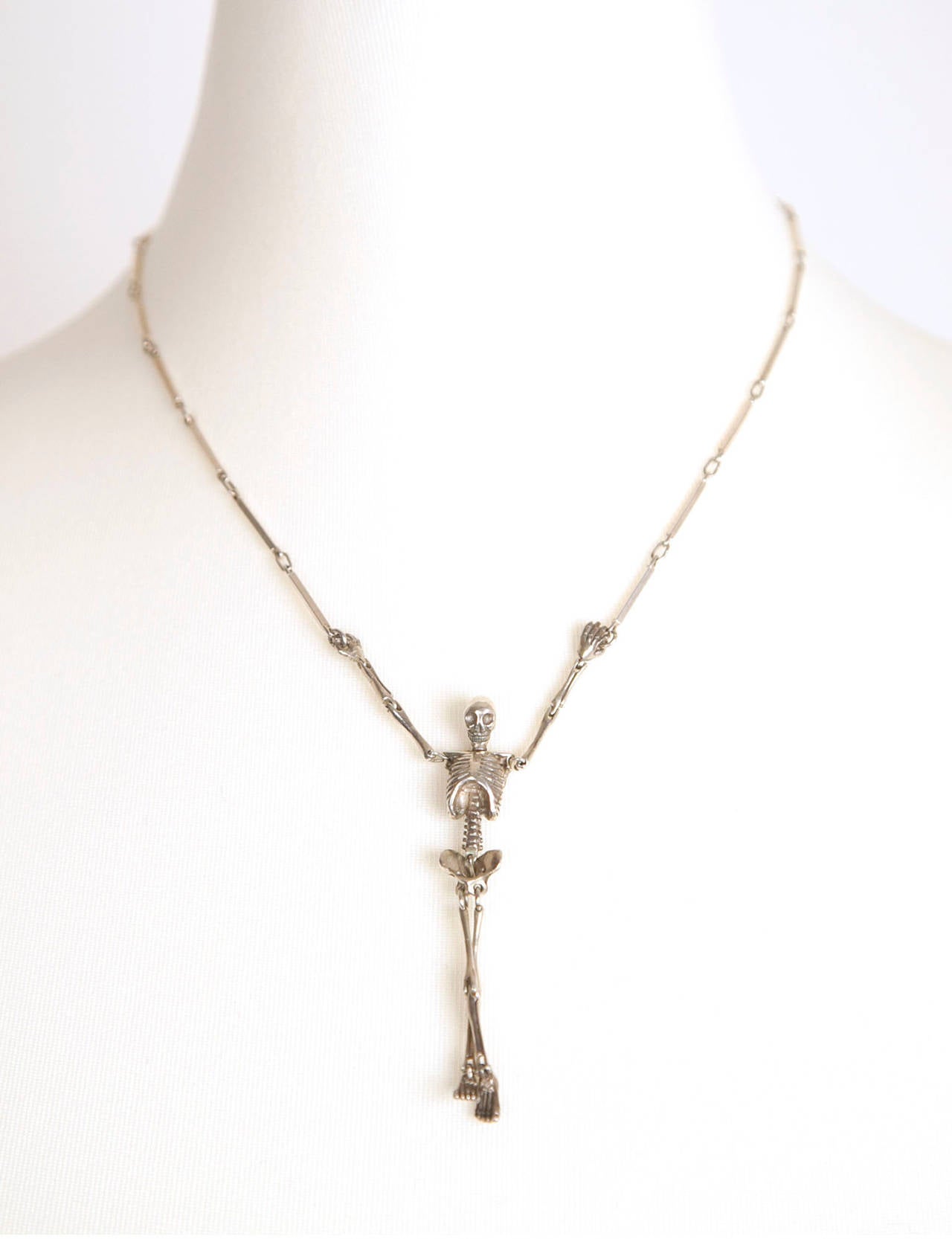 Vivienne Westwood Punk Skeleton Necklace from 1990's. Necklace is in sterling silver with anatomical moving body party and chain linked bones to punk it up even more. This is a true vintage item from The grande dame herself Vivienne Westwood. The