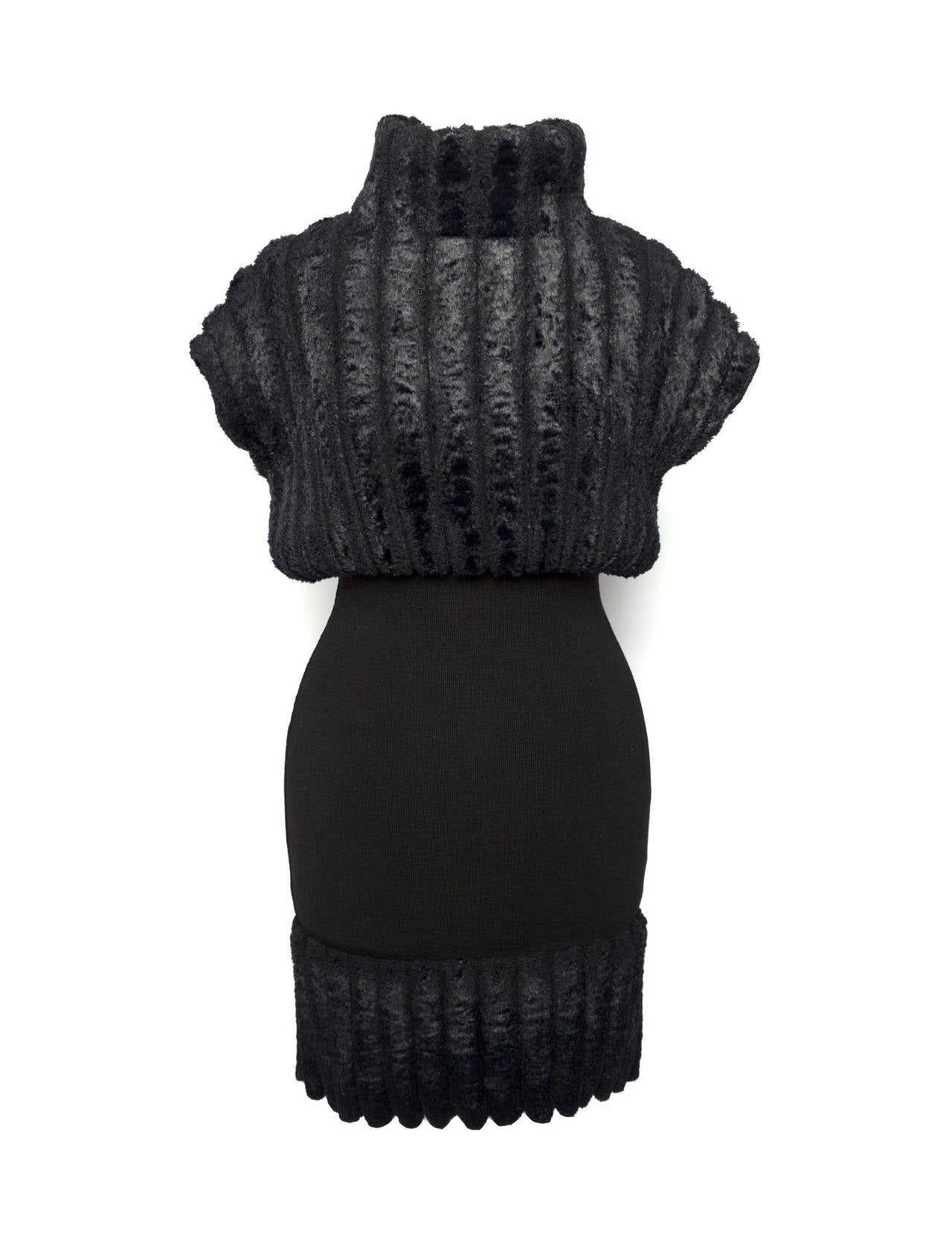 Azzendine Alaia Paris black chenille body con knit mini dress 1990's. Very fitted black ribbed chenille dress from Azzedine Alaia dating to 1990's. A true knitted master piece from the knitted master. Made in Italy. Hidden back zipper. Excellent