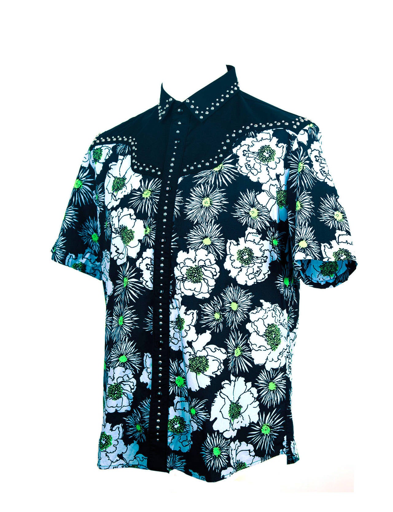 Prada Spring 2012 cowboy studded shirt with Miami Floral print in light blue, chartreuse and black background. Shirts front placket, yoke and collar are solid black cotton with silver stud detail, short sleeve with fitted shape. 