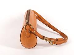 Veil of Politeness by Kyla Boyle cognac leather bag
