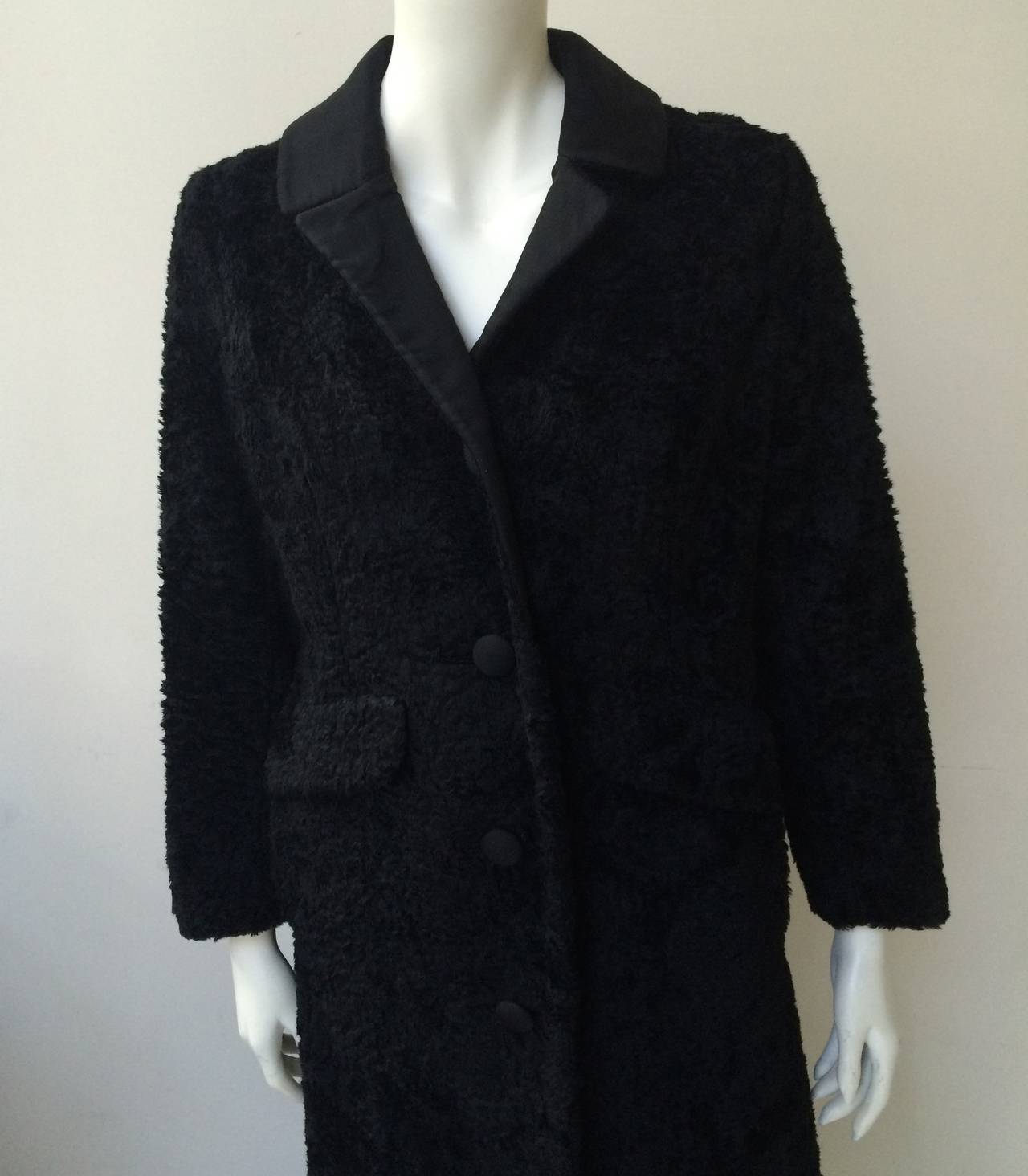 Bonwit Teller 1960s pile fabric long coat will fit a size 8 / 10 but please see measurements.  Fabric by Sidney Blumenthal & Co fabric woven in the USA. There are four fabric covered buttons and two front pockets. Here is the definition of pile