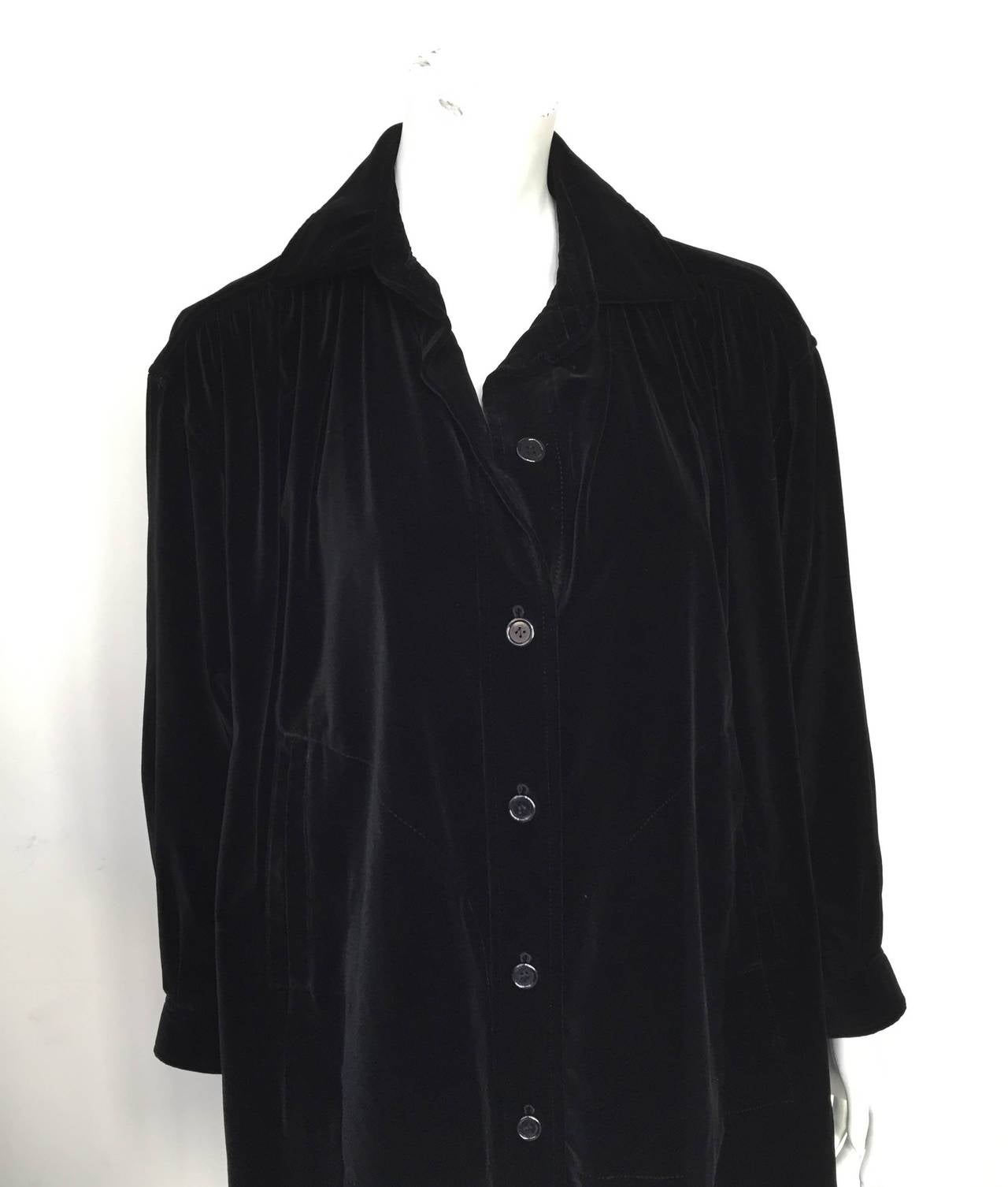 Saint Laurent Rive Gauche 70s black velvet oversized peasant coat. This gorgeous and statement coat could actually be worn as a dress. There are 6 buttons on front and slant front pockets. Made in France and size 42 on label and fits like an US size