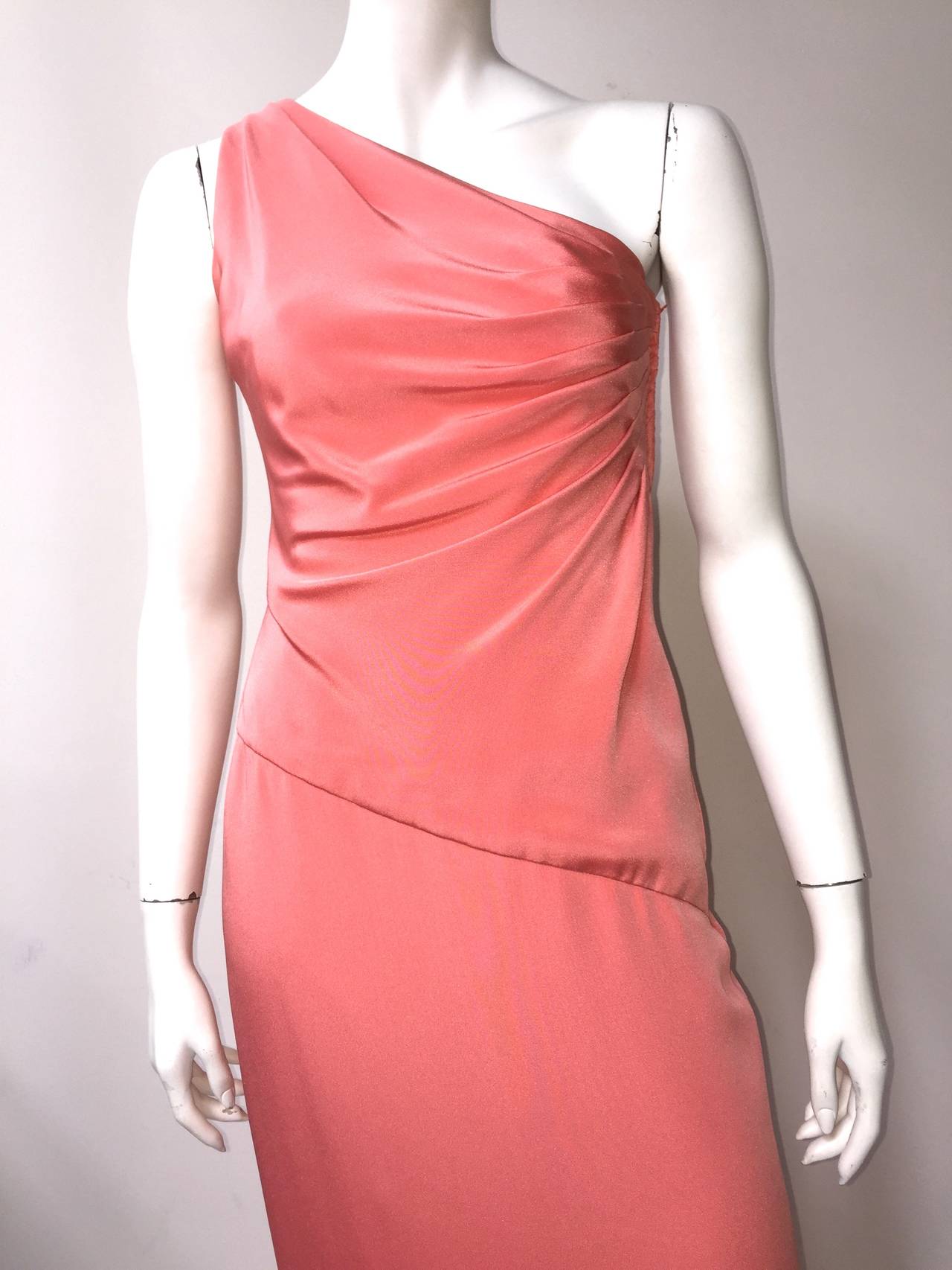 Carolyne Roehm for Sak's Fifth Avenue 1980s one shoulder coral gown size 6 made in the USA.  Zipper on left side of gown. Ruching on side of bodice. This stunning elegant Roehm gown is perfect for that WOW entrance. Please use the measurements I