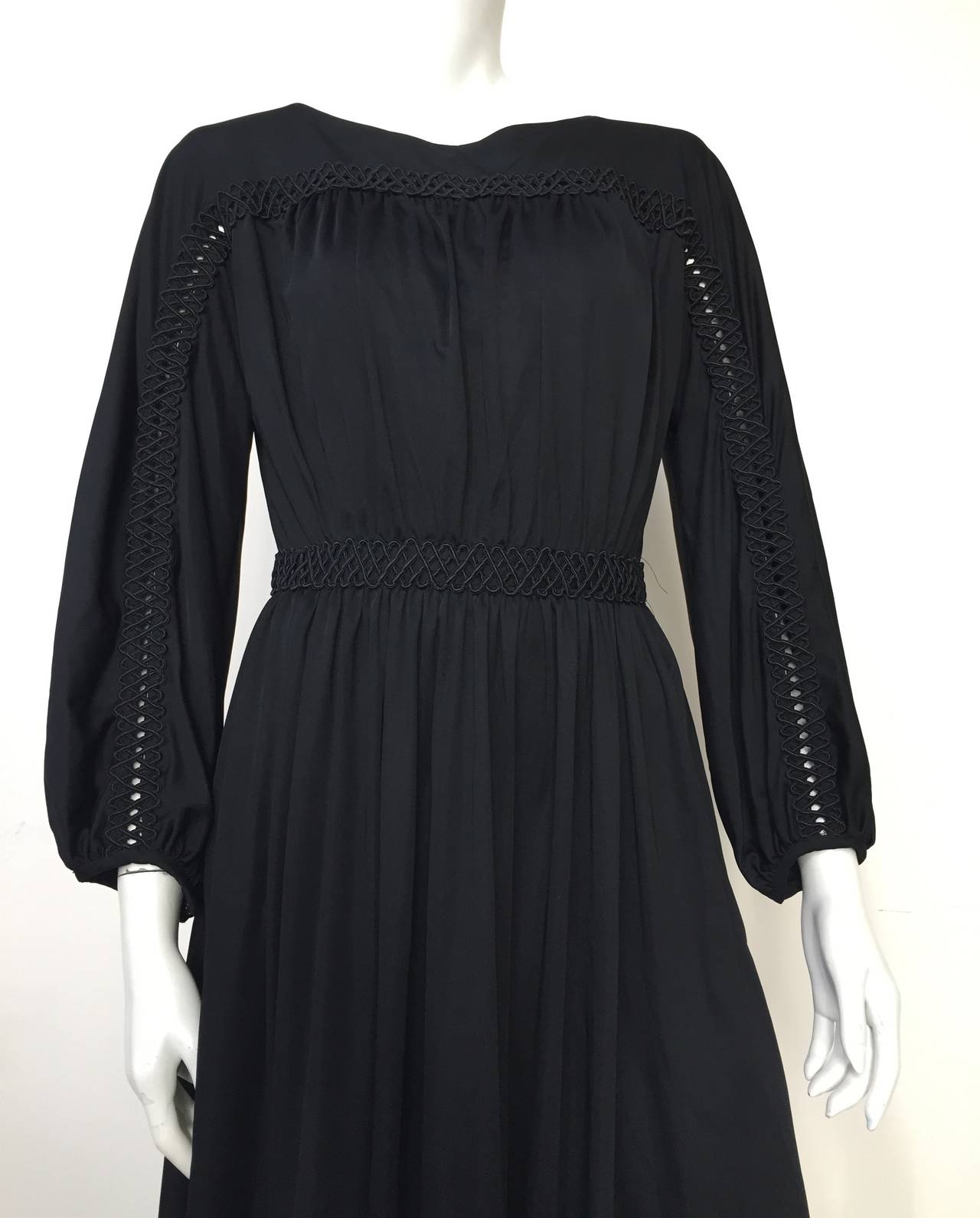 Donald Brooks 70s black jersey dress with pockets made in the USA size 6. Please use the measurements I provide to measure your body so that when it arrives you know it will fit you to perfection. Zipper on back with hook. Gorgeous cutout trim as