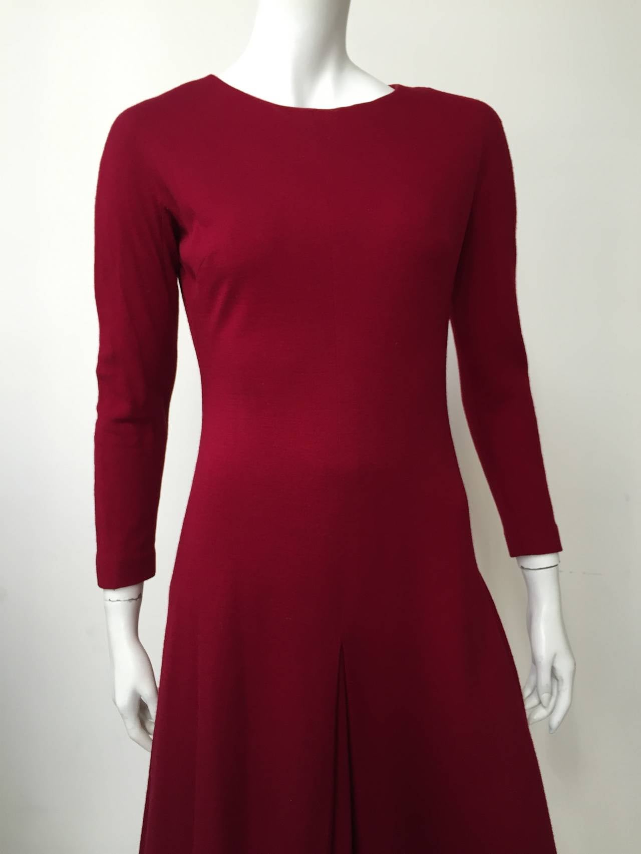 Anne Fogarty 60s wool cut to bodice dress is an excellent example of the craftsmanship of Anne Fogarty and what she was best known for.  
Size 6. 
Ladies please use your measuring tape to properly measure your bust, waist & hips to make certain