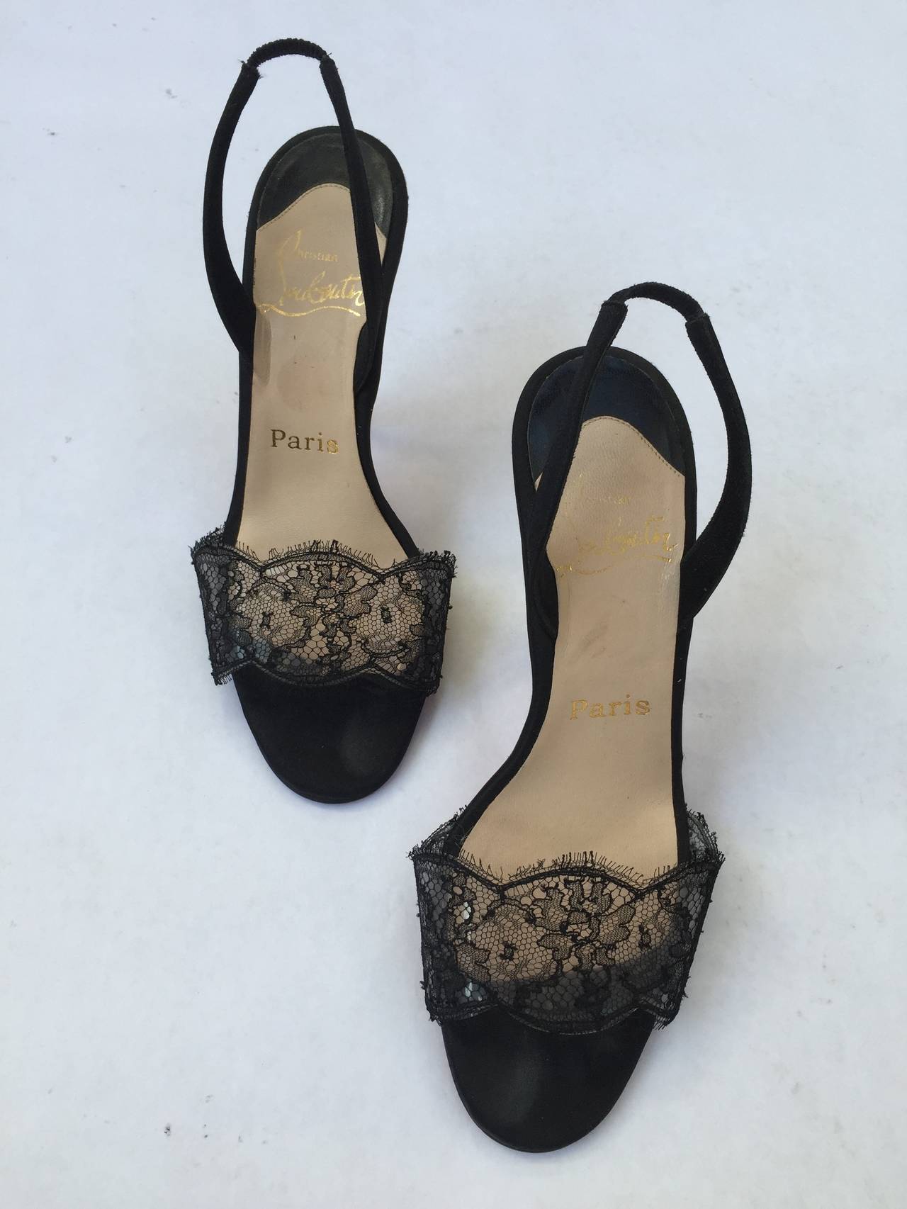 Women's Christian Louboutin black heels with lace trim size 5.5. For Sale