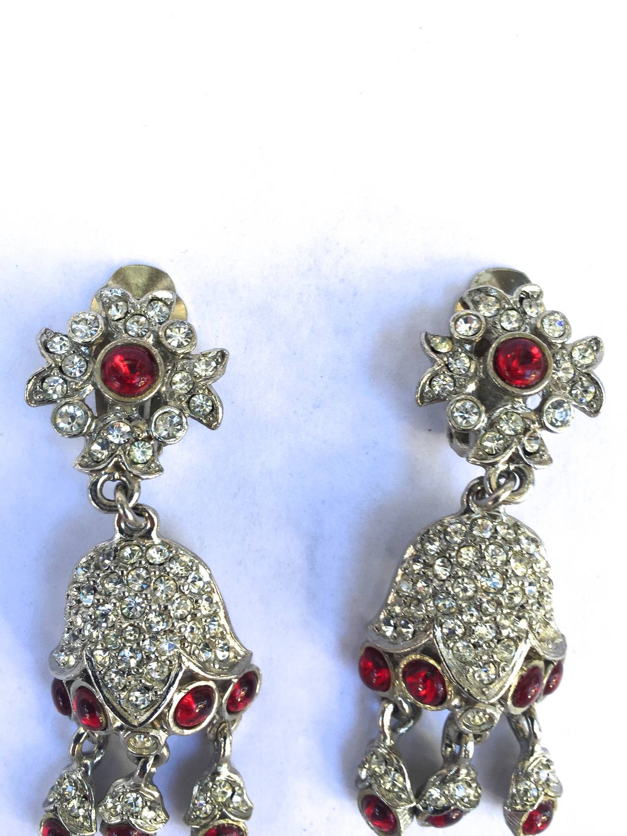 Kenneth Jay Lane 70s crystal flower design chandelier / drop clip earrings. 
Clear & red crystals.
2.75
