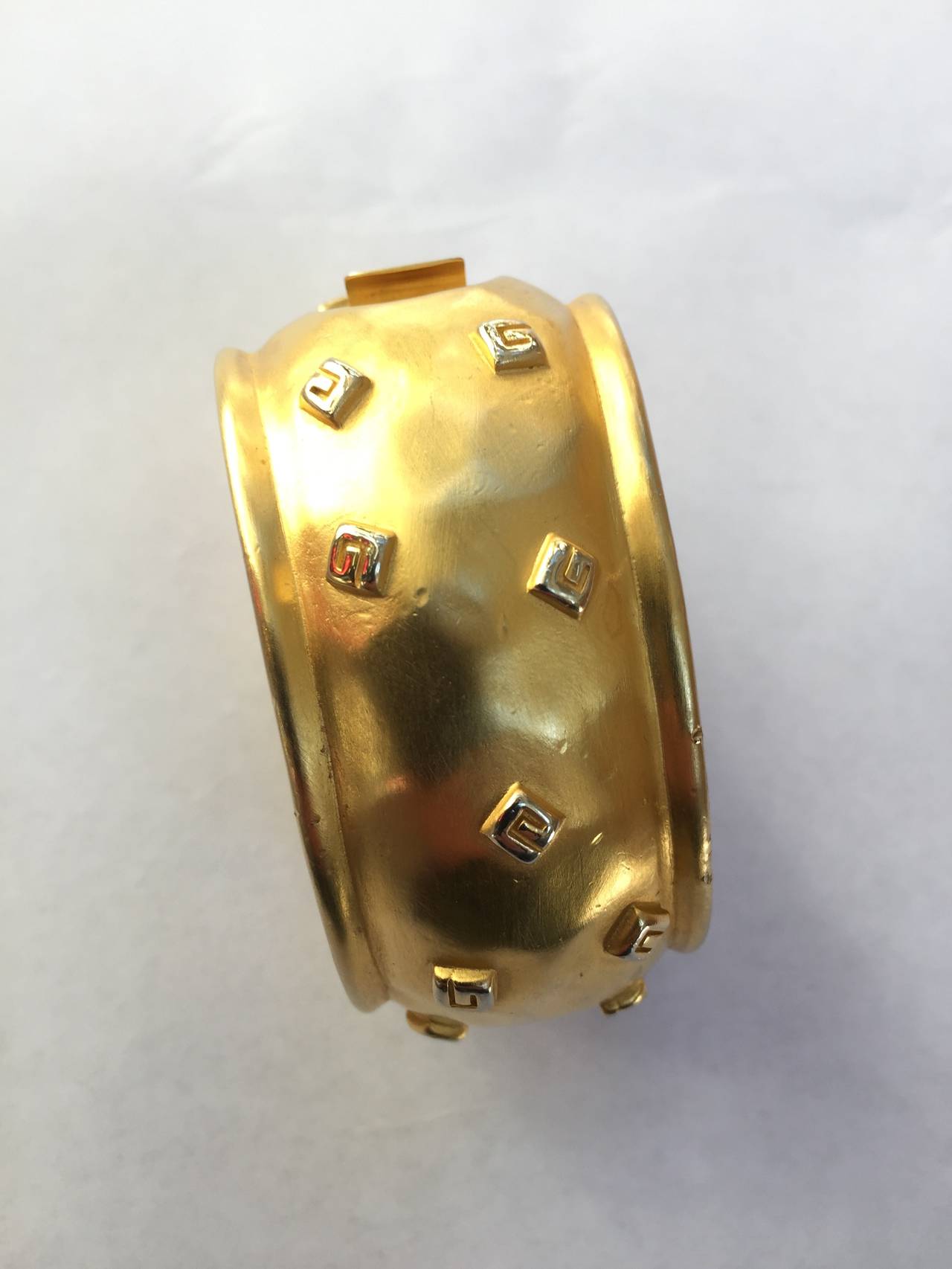 Givenchy 1980s Logo Gold Cuff Bracelet. In Good Condition For Sale In Atlanta, GA