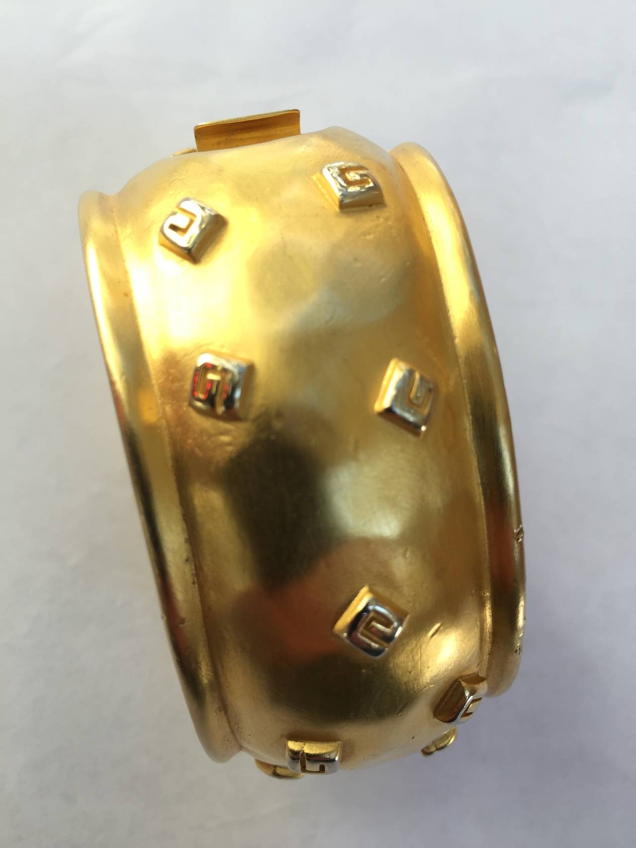 Women's Givenchy 1980s Logo Gold Cuff Bracelet. For Sale