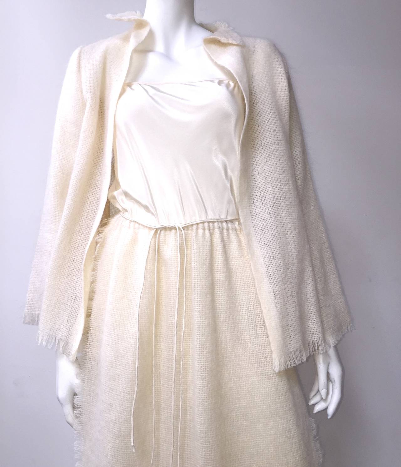 Stunning Alfred Fiandaca Couturier 1980s silk / mohair dress with matching jacket is labeled a size 8 and fits like an USA size 6.  Ladies please grab your tape measure so you can properly measure your bust, waist & hips to make certain this piece