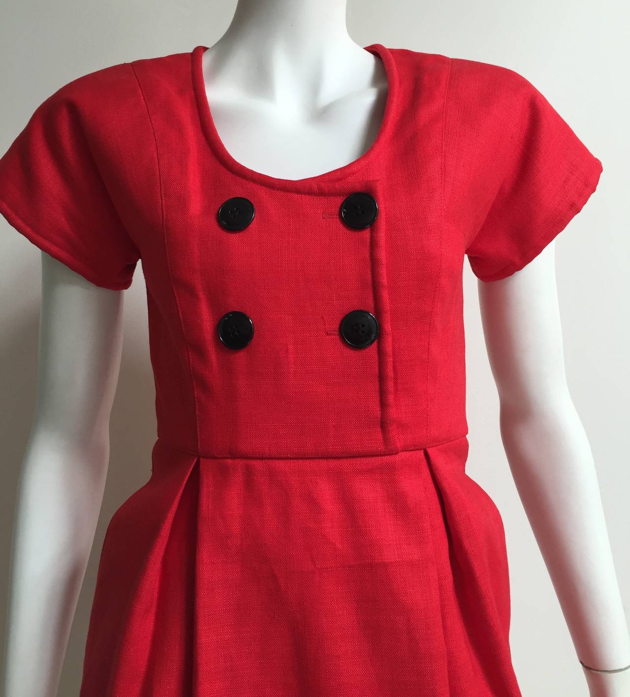 Geoffrey Beene 1970s red linen dress with pockets size 4 was purchased at Neiman Marcus in Houston Texas.  
Silk lining interior. 
The inside of this dress is constructed so beautifully, it really is a piece of art and can't you just see Lee