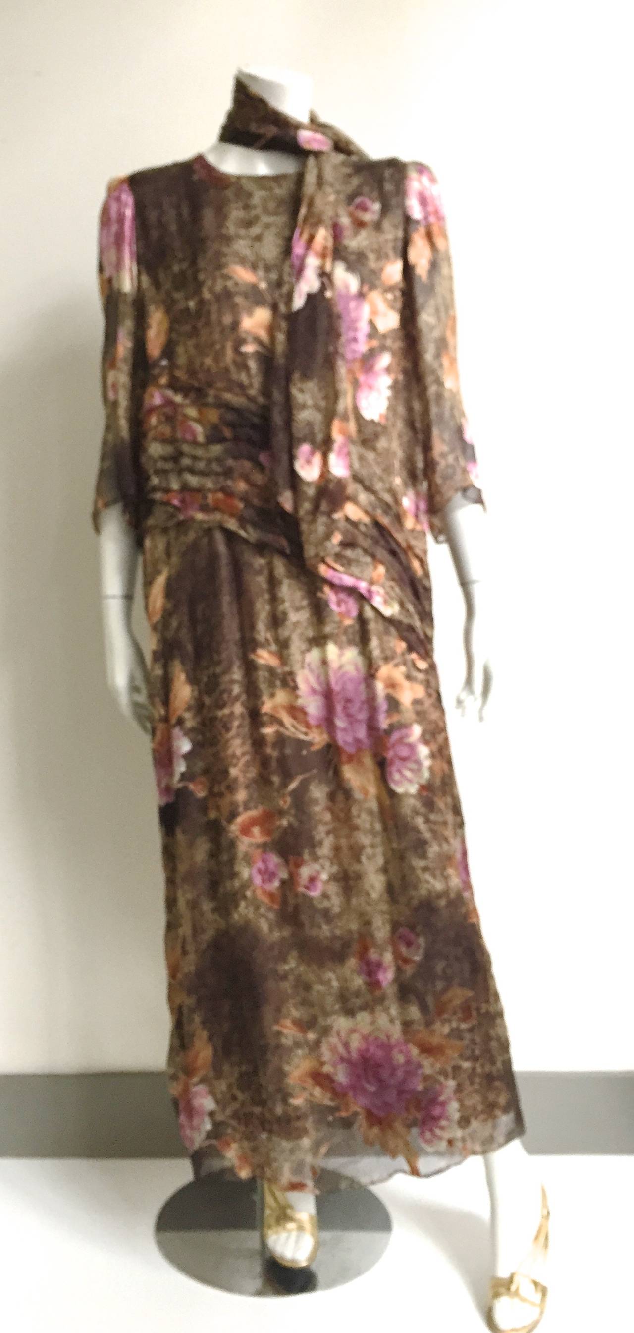 Pierre Cardin 70s silk floral pattern long dress with matching scarf is a size large (size 14) but see measurements. In the photos I tied the scarf around neck and waist giving this dress different looks. This is a size large dress and when the
