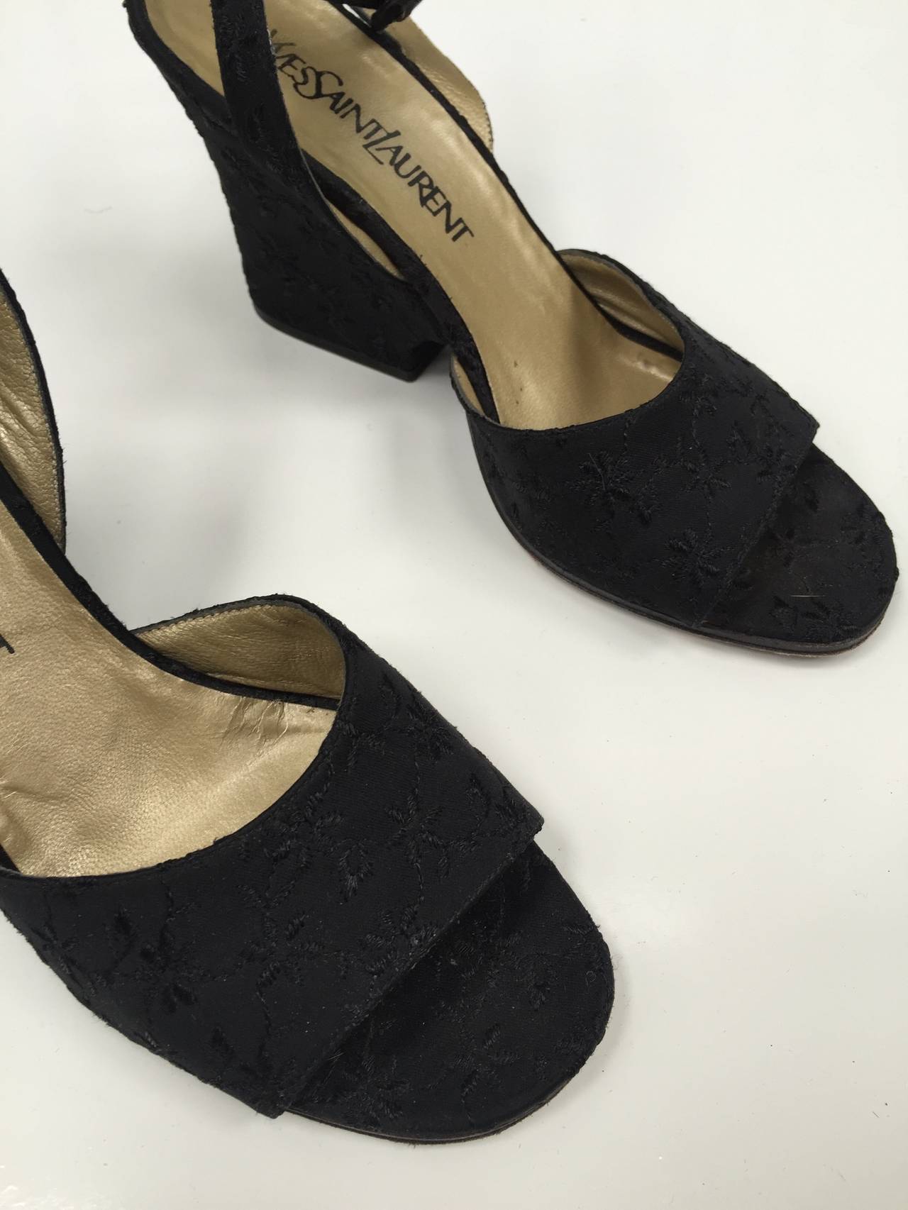 Yves Saint Laurent 1980s black brocade ankle strap shoes size 7.5 M. 3.5" heel.
Made in Italy.