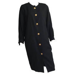 Scaasi 80s black wool button dress with pockets size 12.