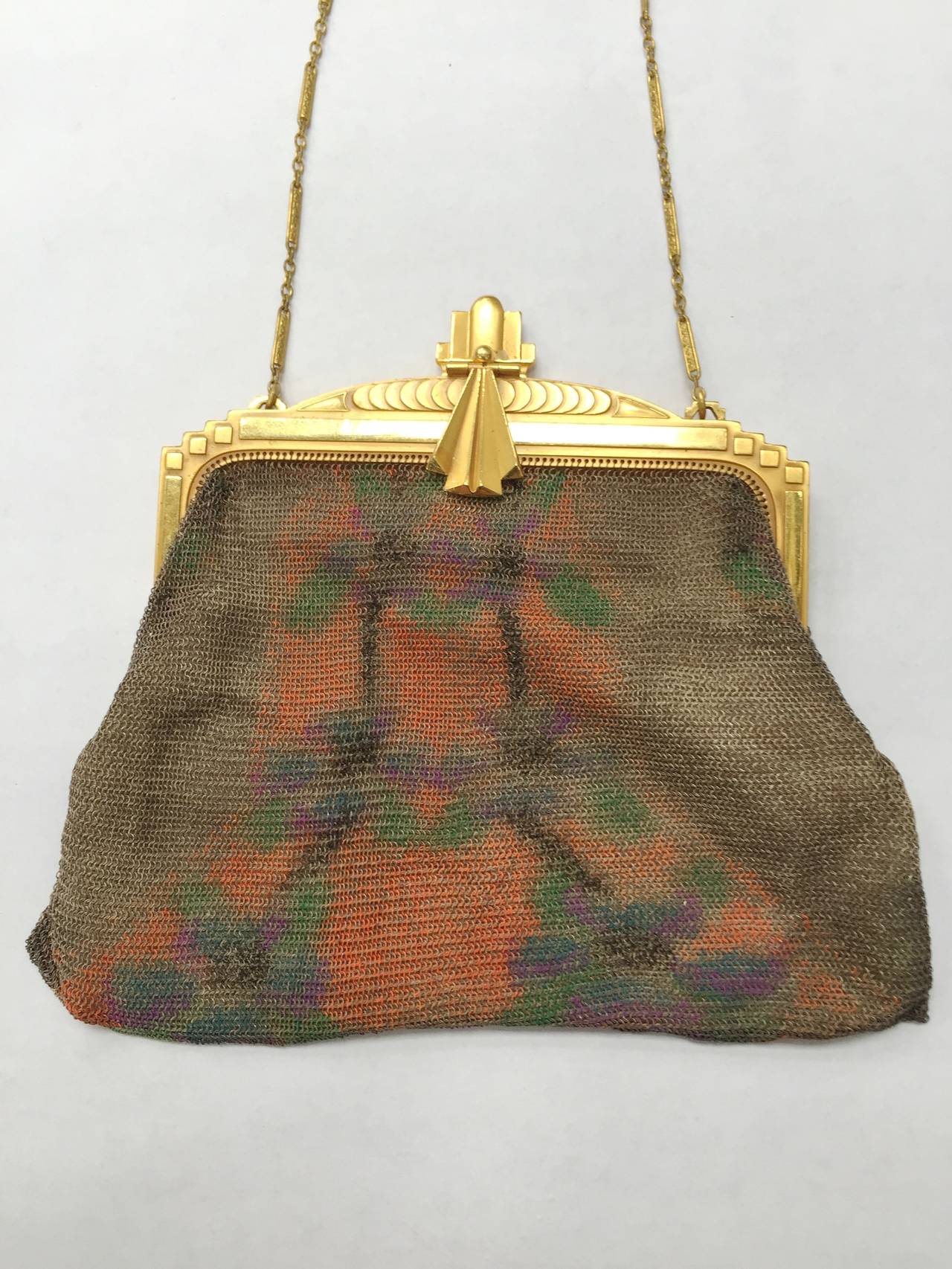 Whiting & Davis 1920s Paul Poiret Art Deco Flapper mesh purse with flower pattern. In 1929 Whiting & Davis produced a large collection of mesh bags designed in conjunction with French fashion designer Paul Poiret these became knows as the 