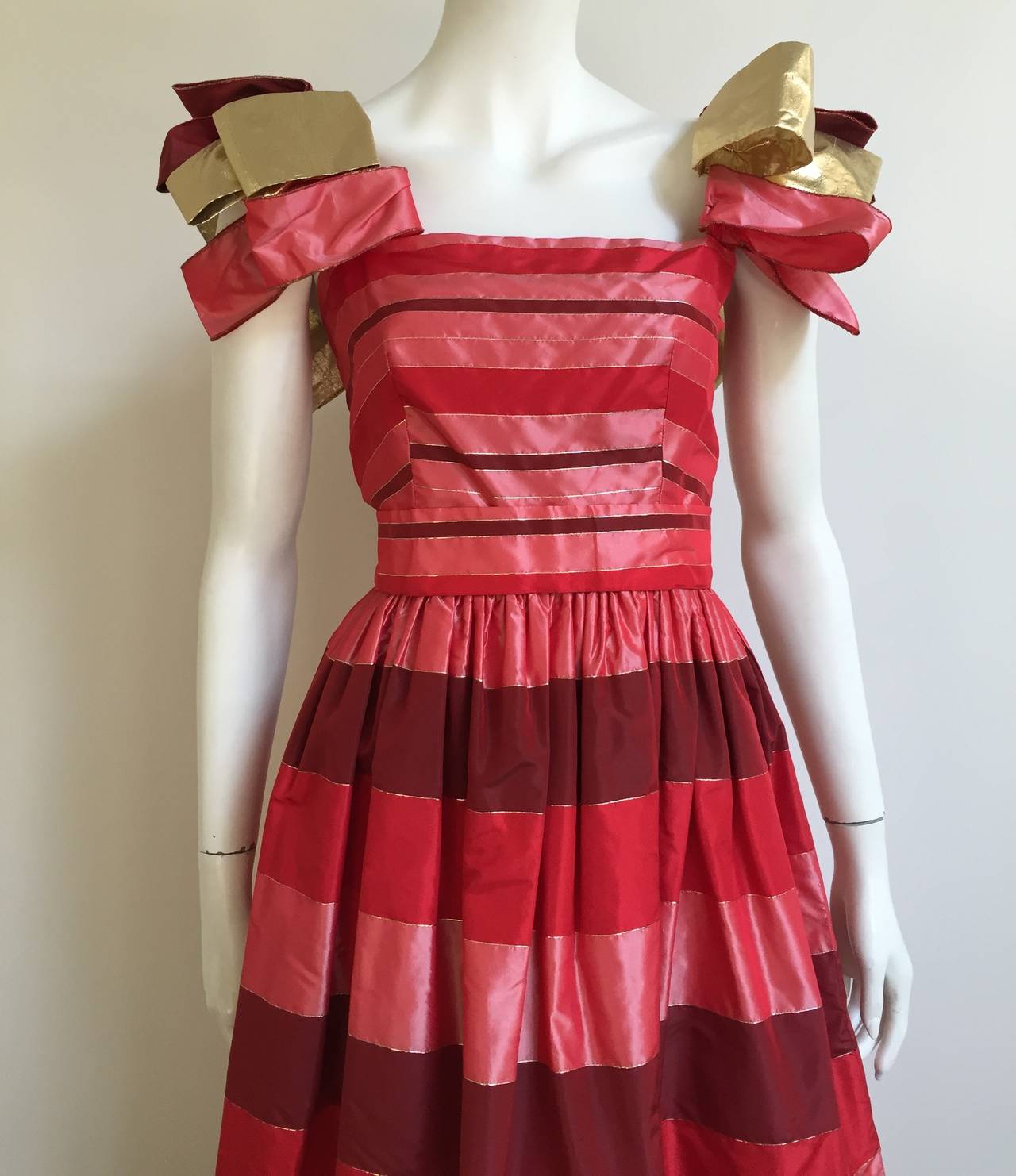 Richilene New York 1970s silk taffeta striped gown size 4 was purchased in Houston Texas at Neiman Marcus. Belt has one snap button and three hook and eye. Gown is lined. Ladies please pull out your measuring tape so you can properly measure your