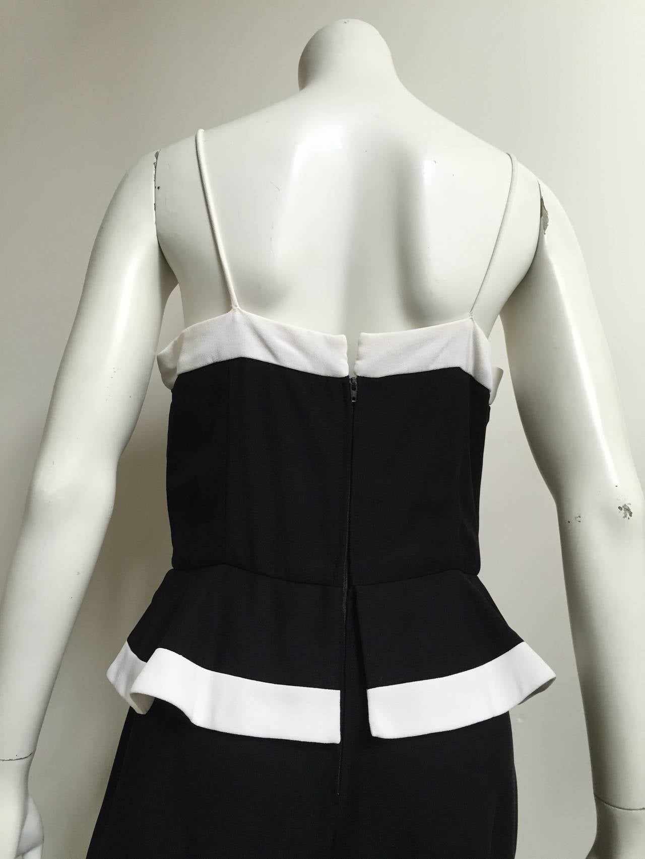 Raul Blanco for Saks 1980s Black and White Peplum Jumpsuit Size 8. In Good Condition For Sale In Atlanta, GA