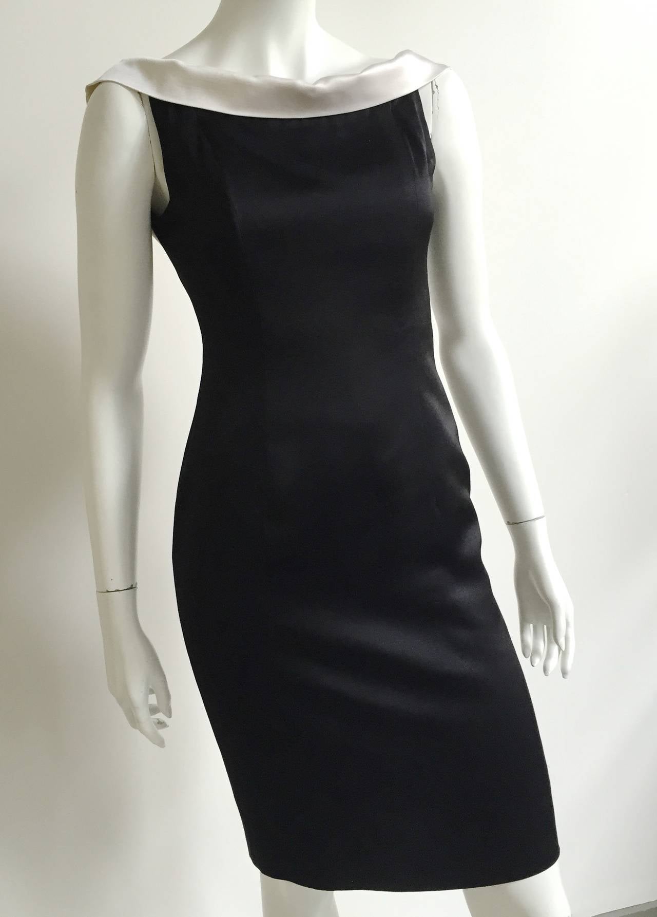 Patrick Kelly Paris 1980s sheath little black dress original size 6 but fits like a modern day 4 ( Please see & use measurements). Made in France. This Patrick Kelly stunning black dress with white collar will have all eyes on you when entering any