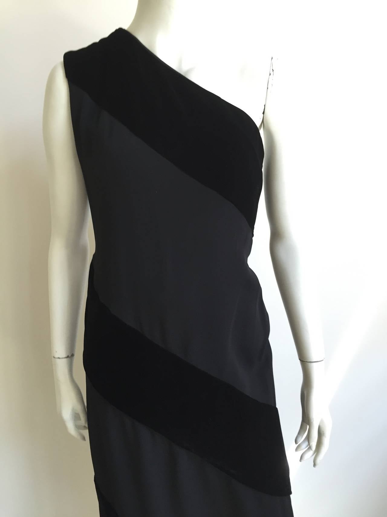 Carolyne Roehm 1980s black wool ~ black velvet spiral strip one shoulder black tie gown. Corset interior lining with own zipper for extra support. Gathered draped fabric at back of waist when lifted appears to be gown's train. Simply gorgeous and