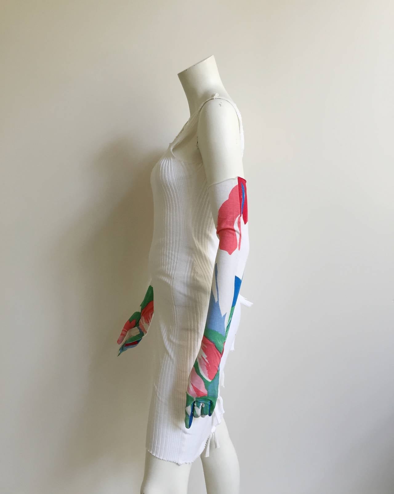 Patrick Kelly late 1970s white ribbed cotton dress with gloves size 4. This piece is from the collection of Carol Martin who was a long time friend & model in the 70s & 80s.  Carol Martin said the dress was given to her by Patrick Kelly to use in a