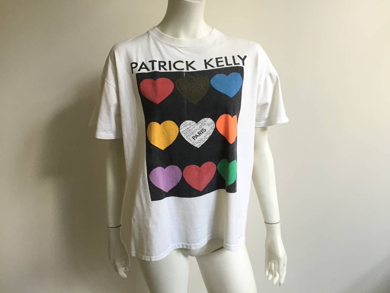Patrick Kelly 1988 'Hearts' t-shirts is from the private collection of long time friend & model Carol Martin. Patrick Kelly gave this t-shirt to Carol Martin while she was in Paris.
Measurements are: 
44