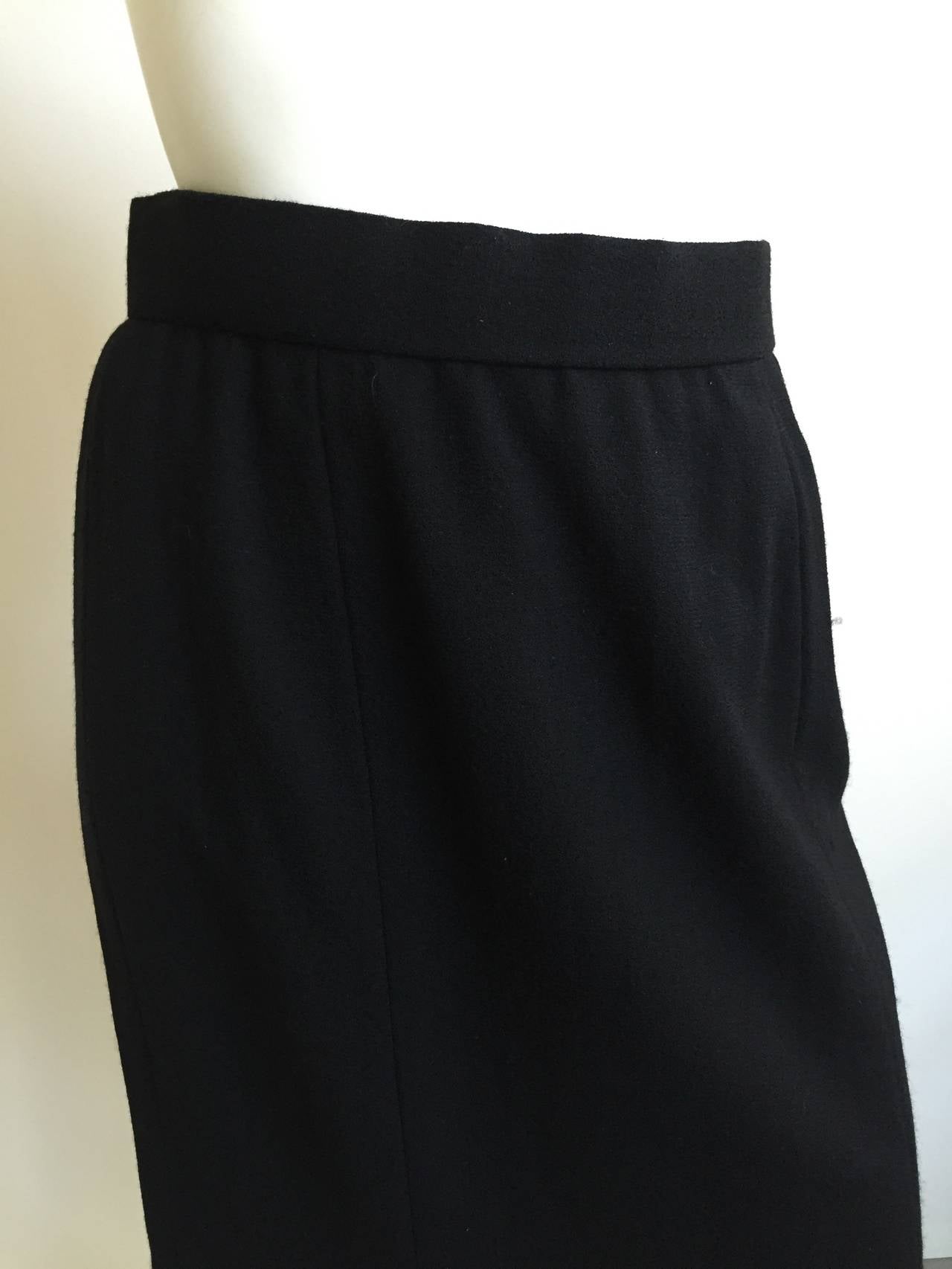 Bill Blass 1970s long black wool skirt original vintage size 12 but fits like a modern size 4/6. Ladies please grab your tape measure so you can properly measure your waist & hips to make certain this treasure will fit your lovely body. Fits high at
