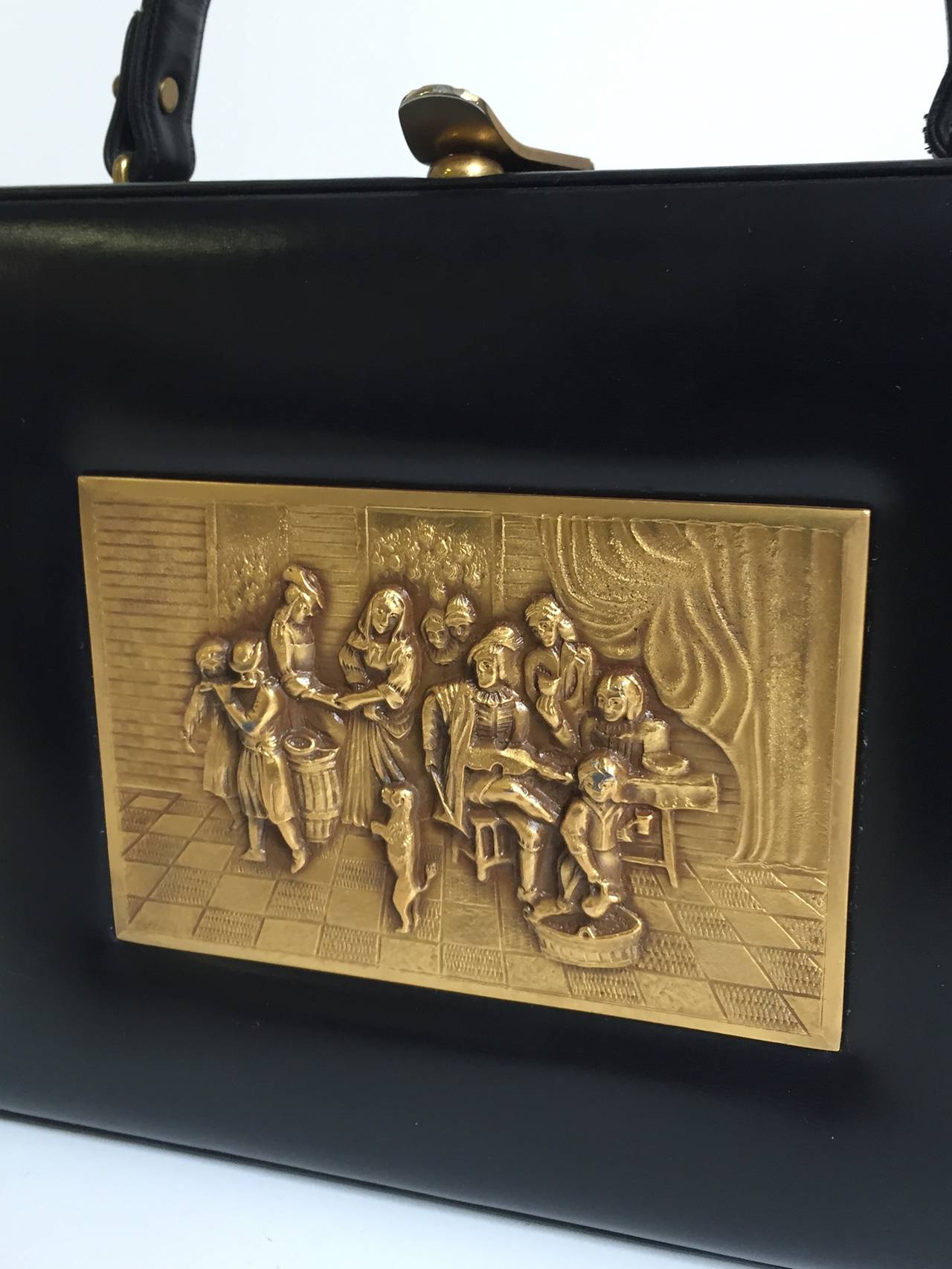 Prestige 60s brass relief black leather handbag. In Good Condition In Atlanta, GA