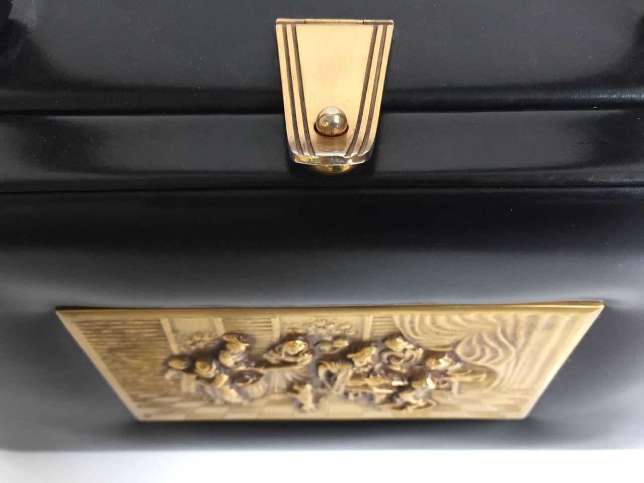 Prestige 60s brass relief black leather handbag. 2