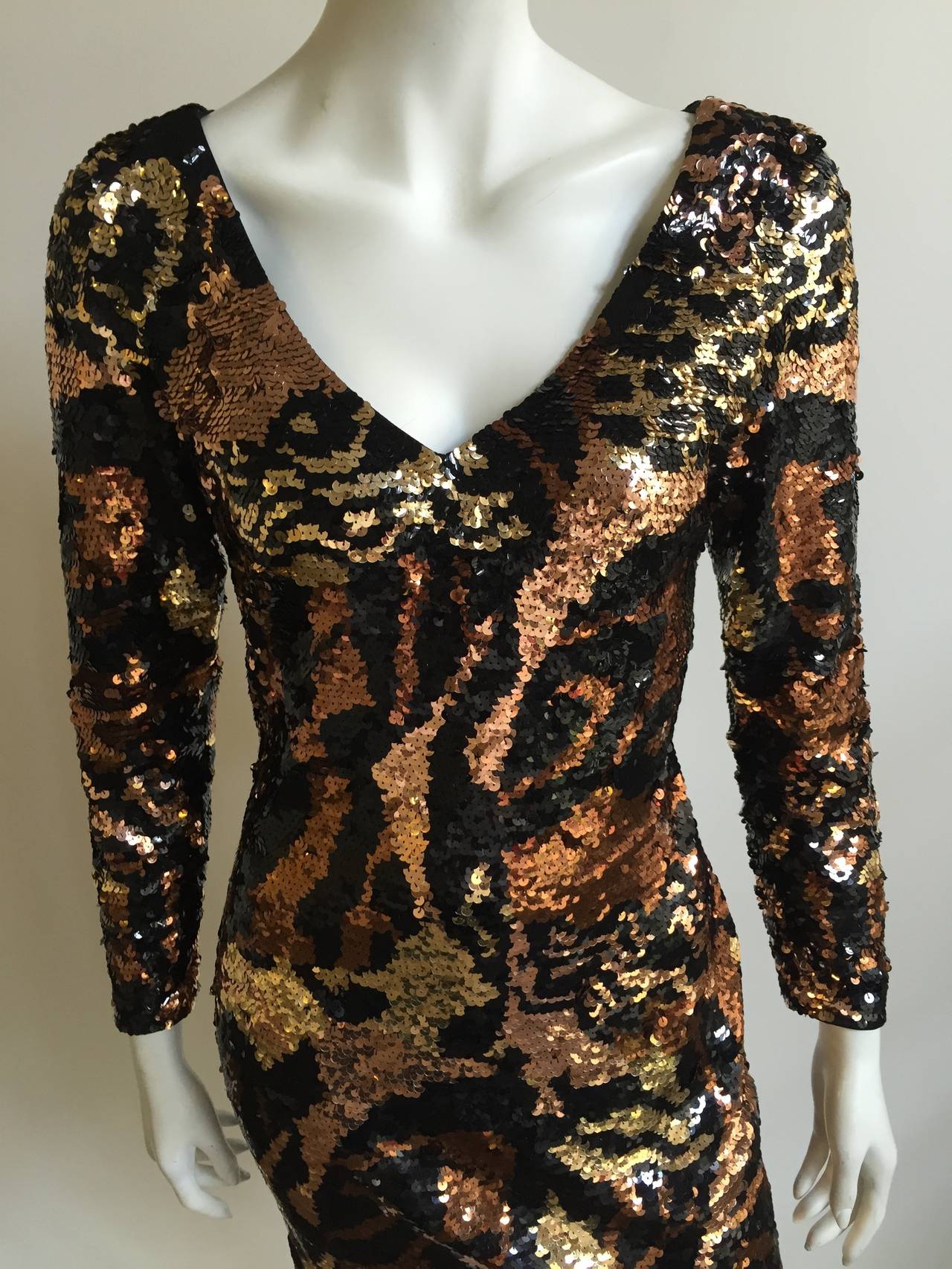 Oleg Cassini Black Tie 1980s sexy sequin dress original size 8 but fits like a modern size 6 ( Please see & use measurements). Shades of gold, bronze & copper make this pattern eye candy. Completely lined inside for added comfort with a