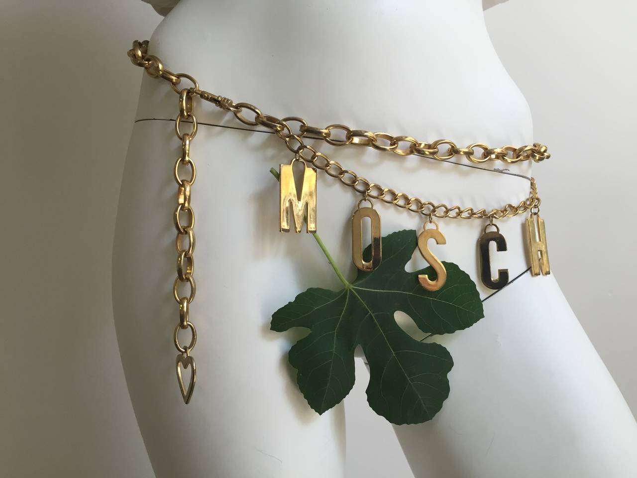 Brown Moschino 80s gold chain adjustable waist belt.