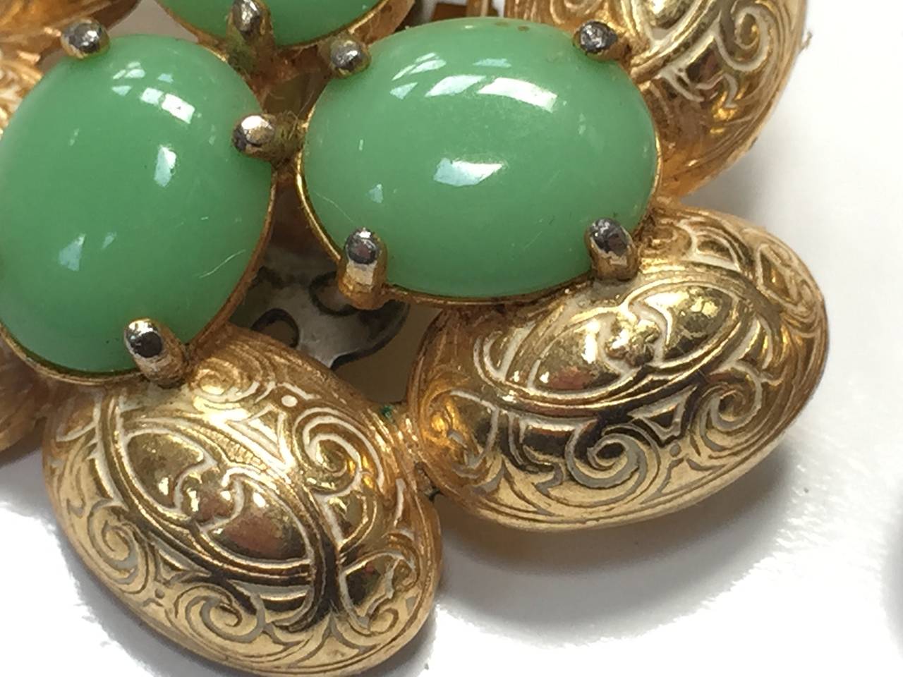 Elsa Schiaparelli 60s gold clip earrings. In Good Condition For Sale In Atlanta, GA