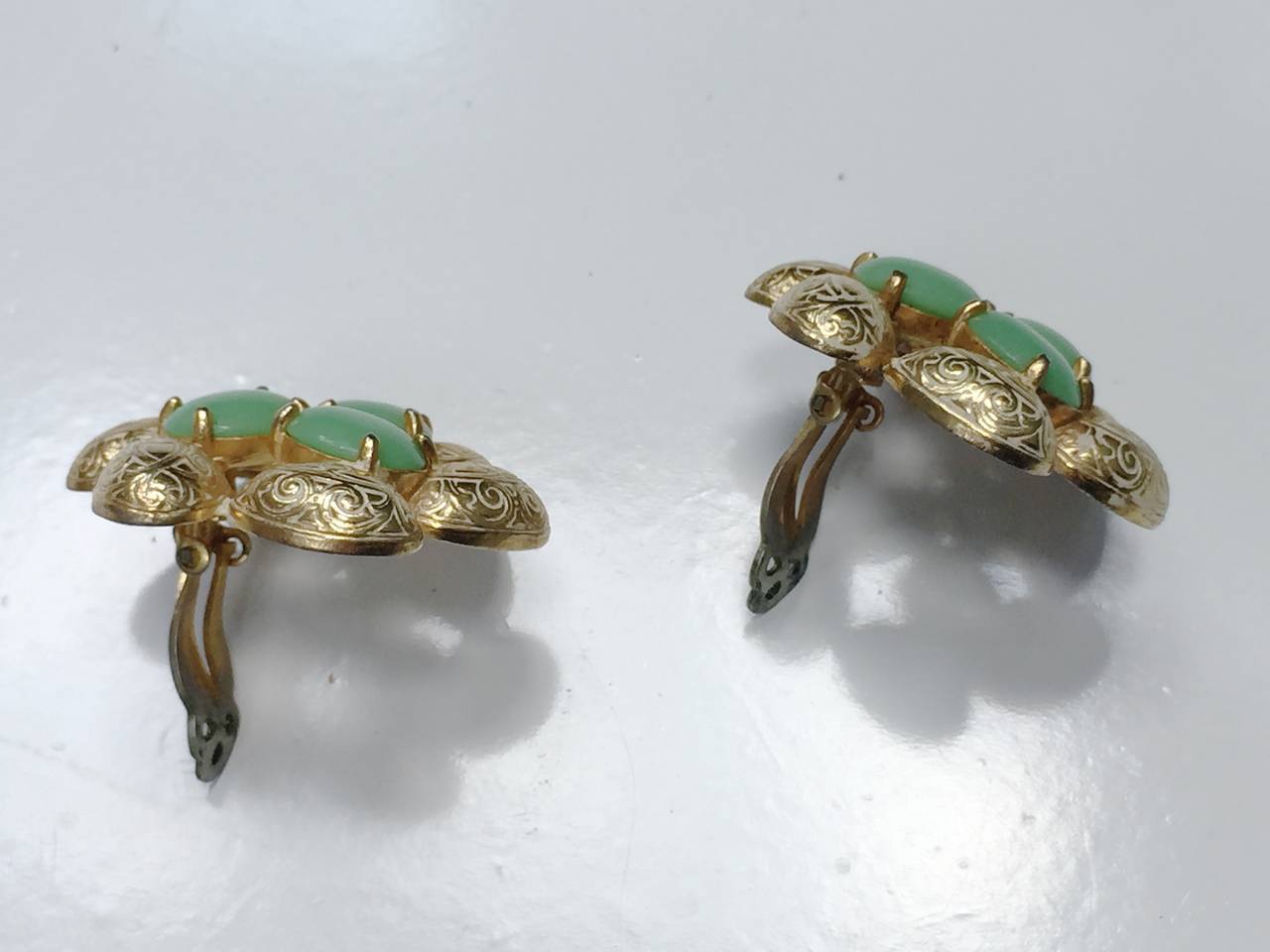 Elsa Schiaparelli 60s gold clip earrings. For Sale 2