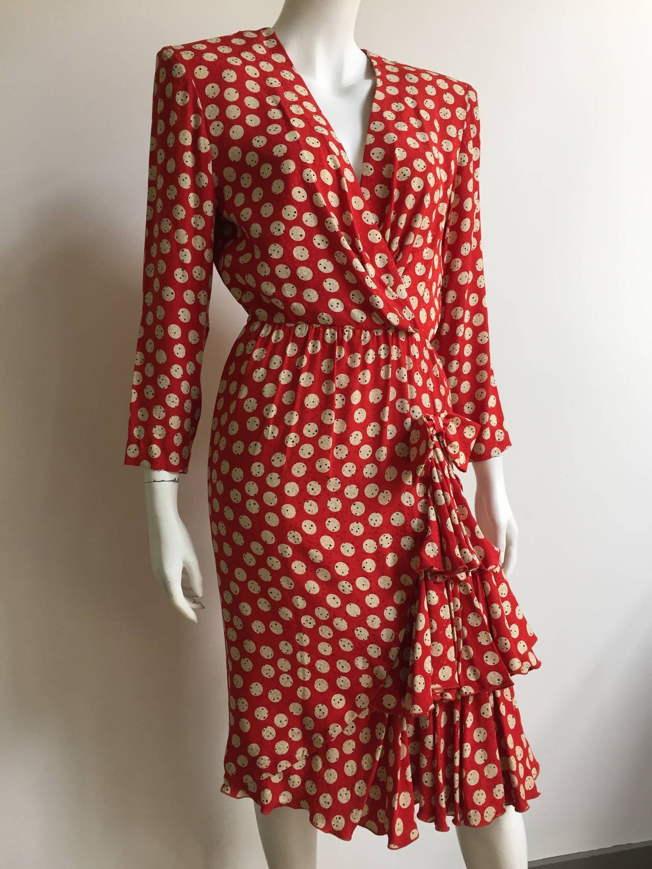 Pierre Balmain Ivoire 1980s red silk polka dot dress French size 38 fits like a US size 6 ( Please see & use measurements to make sure this fits your body perfectly). Dress was never worn still with tag. Dress is lined. Bow tier drop ruffles on