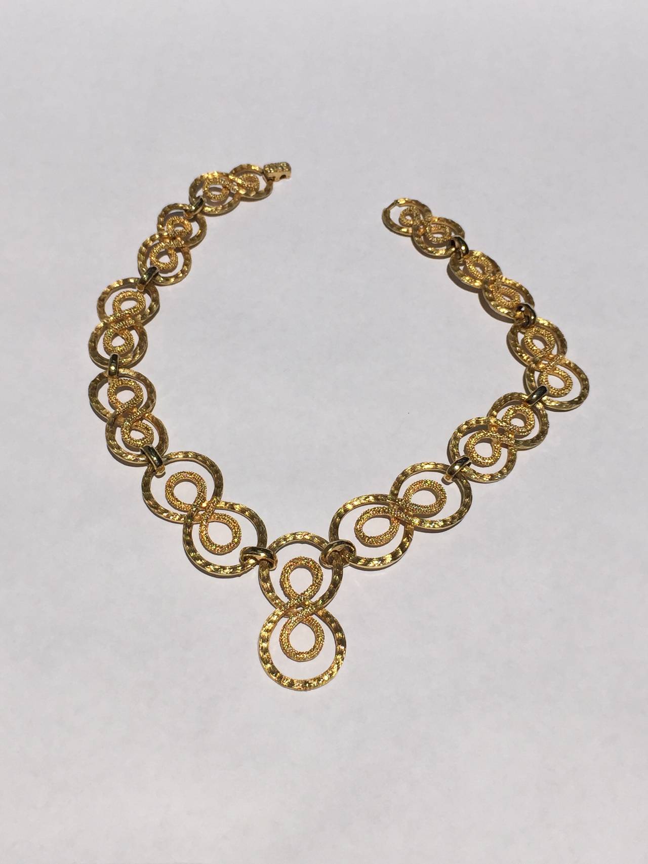 Lucien Piccard infinity circle gold necklace. For Sale at 1stDibs