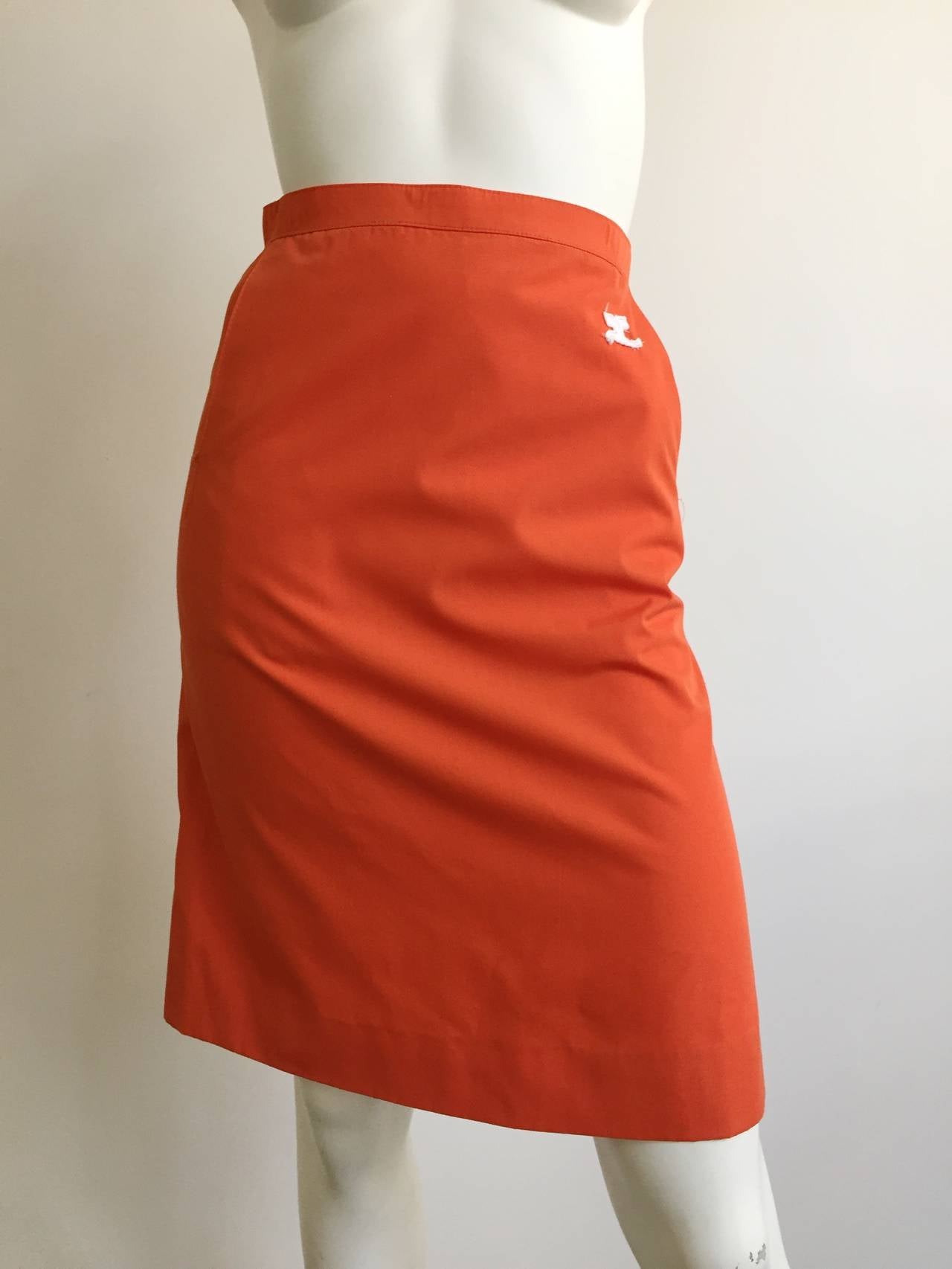 Courreges Paris 1980s orange cotton skirt with pockets made in France and fits a size 4 ( Please see and use measurements).
This form fitting sexy cotton casual Courreges Paris skirt is perfect for any day time event.
Measurements are:
25
