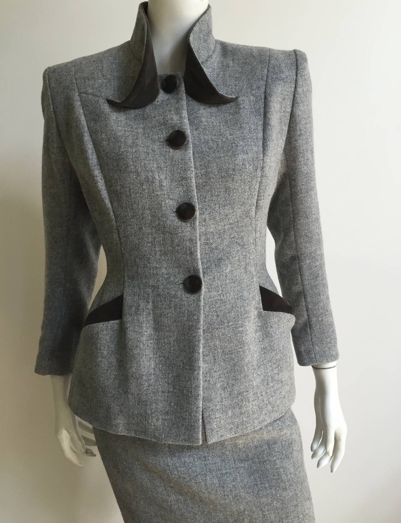 Emmanuelle Khanh Paris 1995 wool with velvet trim and buttons with swoop collar is a original French size 38 but fits like a modern USA size 6 ( Please see & use your tape measure to measure your body). Worn together as a power suit or separate for