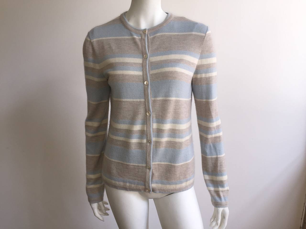 Bill Blass 1970s cashmere top with matching cardigan set is originally size medium but fits a size small today ( Please see & use your tape measure to properly measure your lovely body). Horizon stripes of shades of creams, tans & baby blue paired