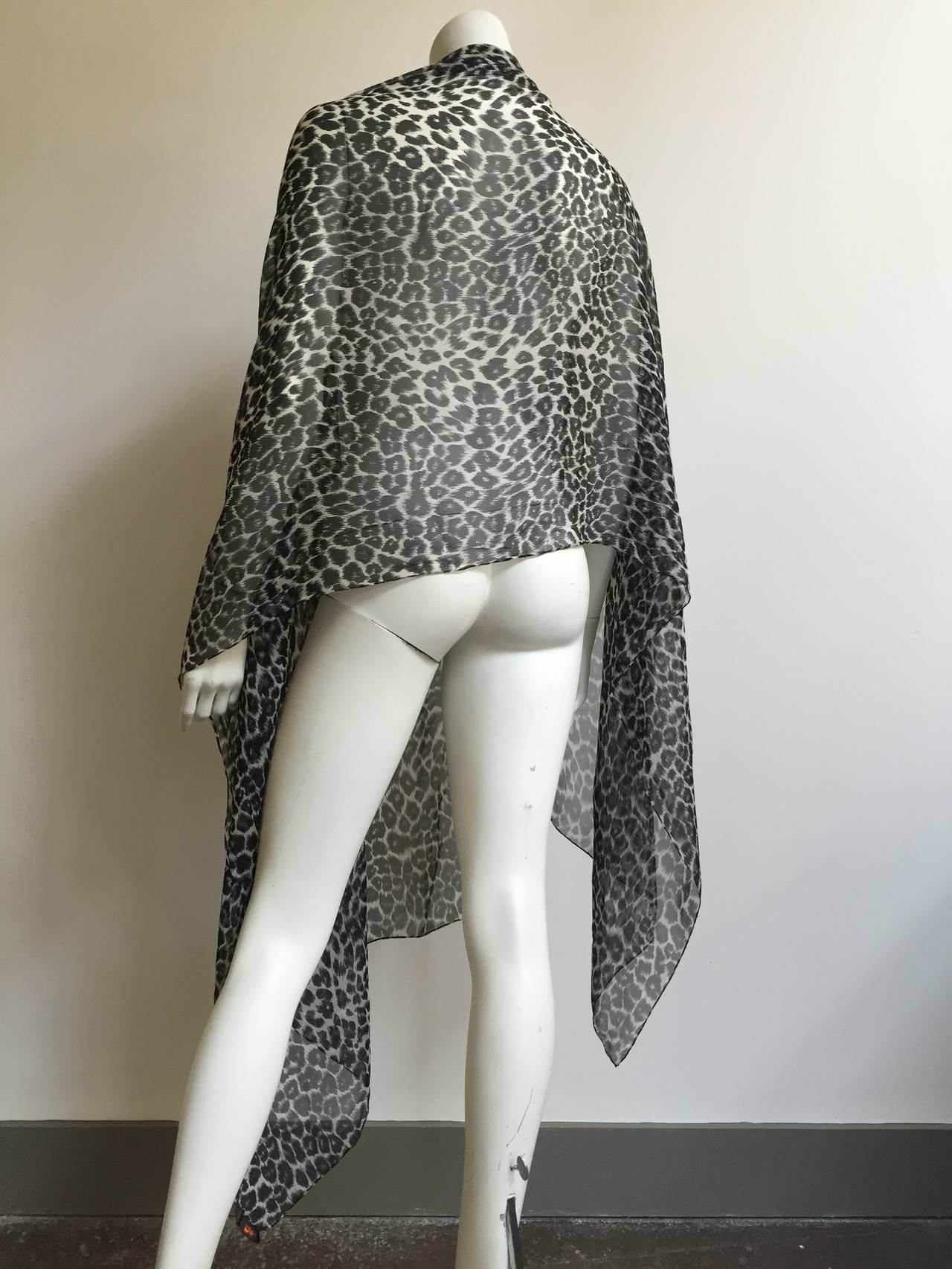 Women's or Men's Yves Saint Laurent silk cheetah print long scarf.