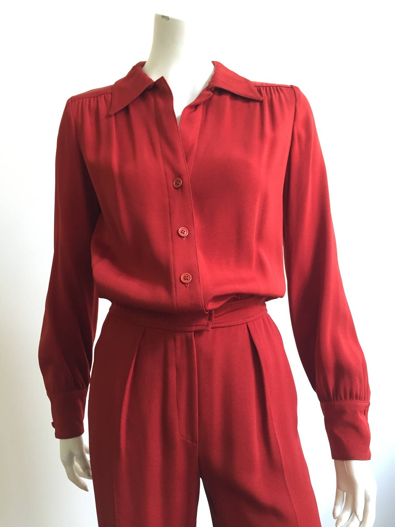 Anne Klein for I.Magnin early 1980s rust color jumpsuit with pockets is a size 4.
Classic and timeless Anne Klein jumpsuit would be perfect for just about anything from grocery shopping at Kroger to dinning at The Four Seasons for lunch.