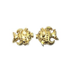 Gianni Versace gold fish clip-on earrings.