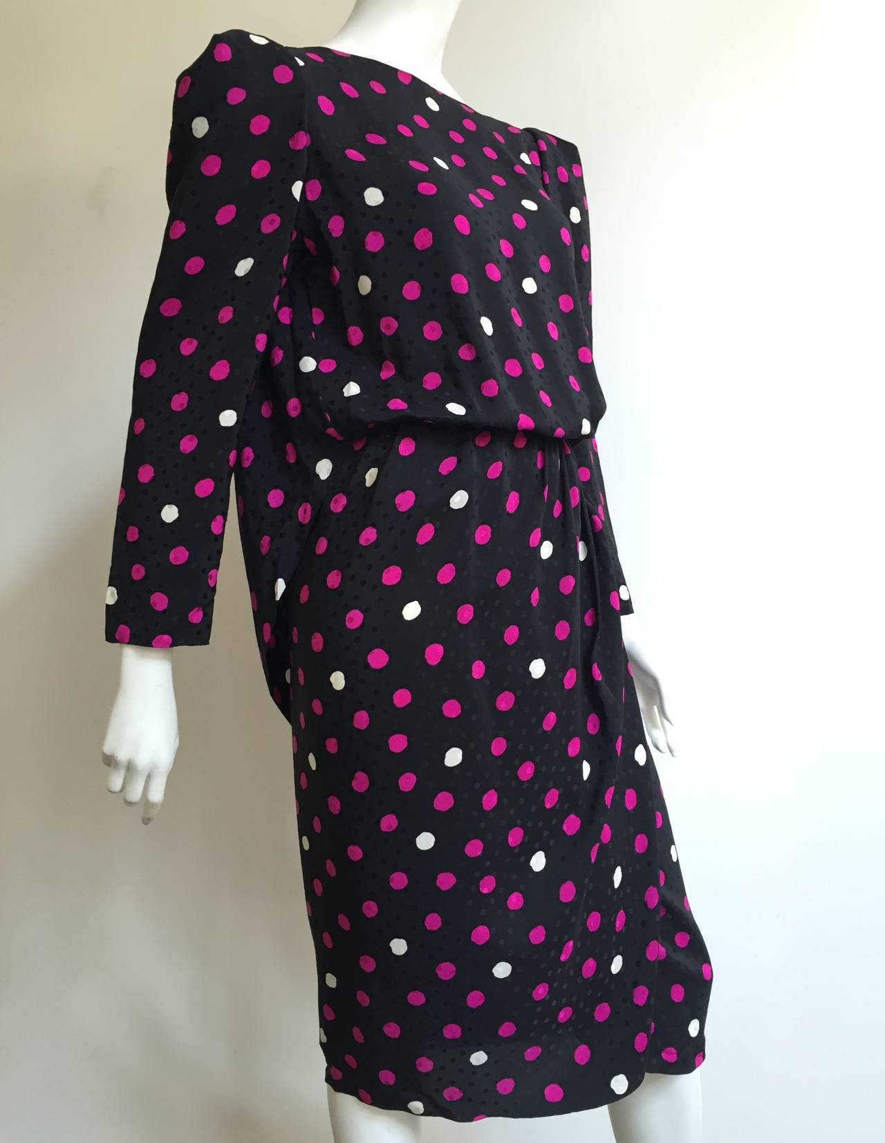 Bill Blass 1970s silk polka dot dress with draped cape and adjustable tie in back of neckline. Wrap skirt bottom on dress. Vintage size is a USA 12 but fits like a modern USA 8 ( Please see & use measurements so that you can properly measure your