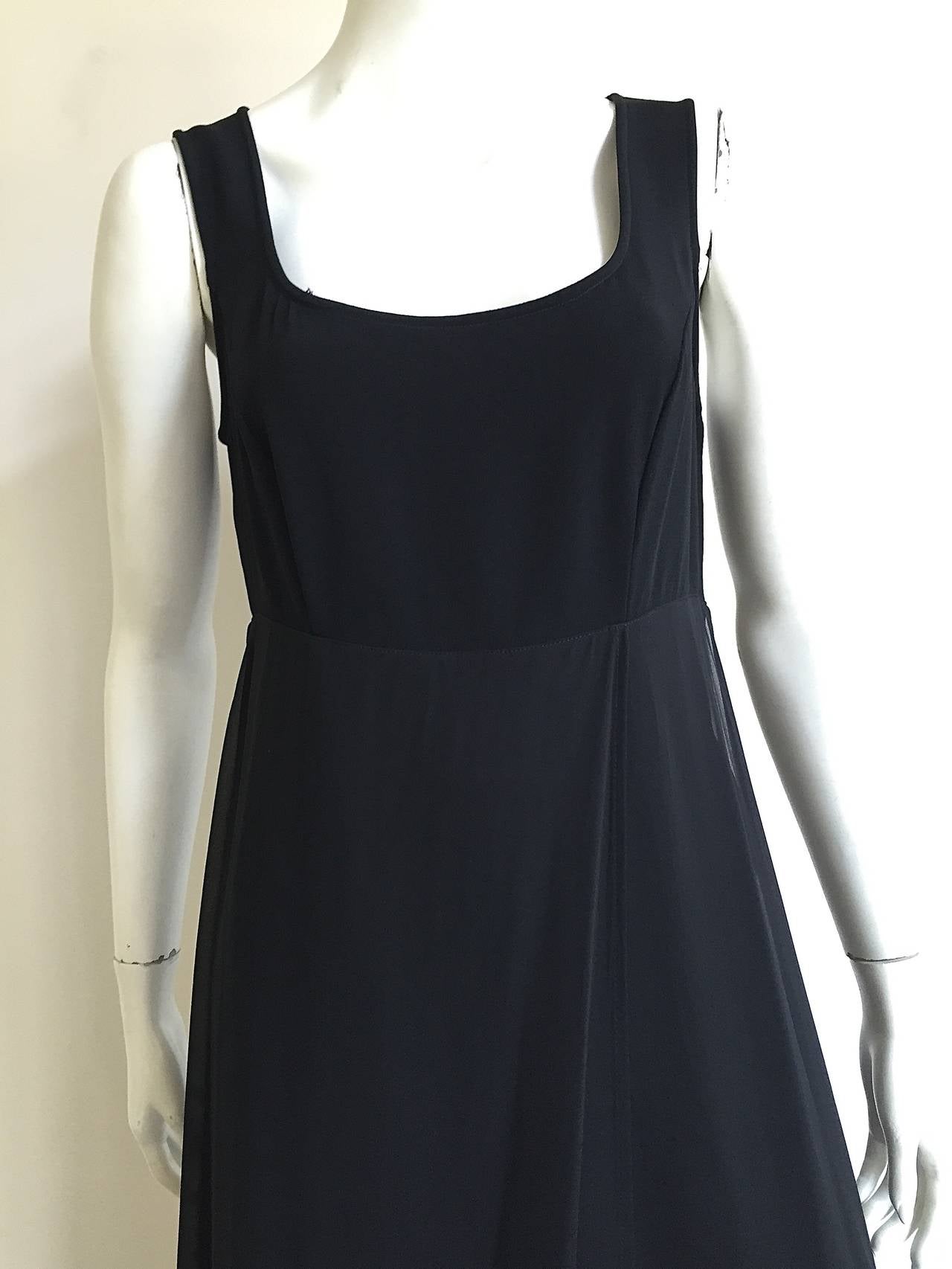 State of Claude Montana 1990s black dress with silk panels that drape in front & back of dress. Original size is an Italian 44 or USA size 8. Please see & use measurements I provide so that you can properly measure that lovely body of yours.