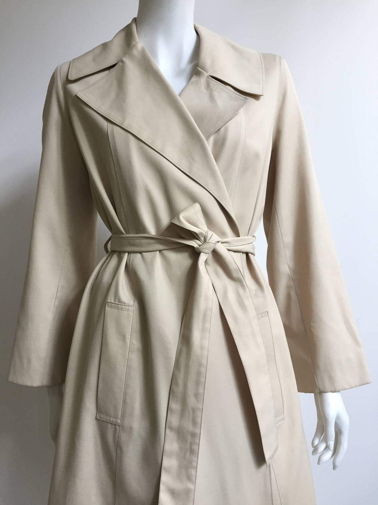 Halston for Misty Harbor 1970s trench coat is a size 10.
Stylish and forever chic this Halston trench coat can work any room at any place. Timeless and classic.
Trench coat is lined. 
Just dry cleaned.
Measurements are:
24"