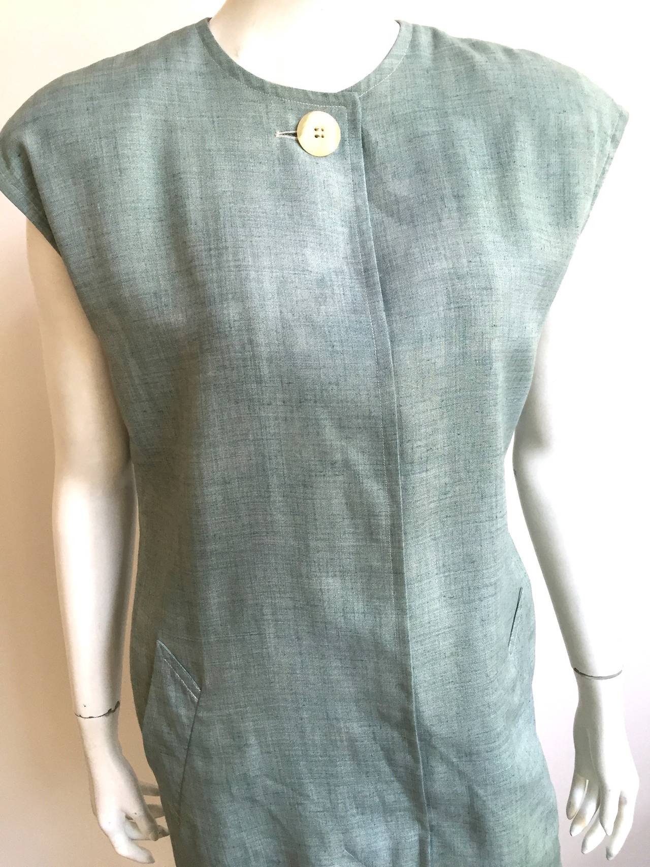 Guy Laroche 1970s linen blend dress with pockets is a French size 38 and a USA size10.  Please see & use measurements to that you can measure your body to make sure this will fit your lovely body.. Dress is lined. Dress was designed to be